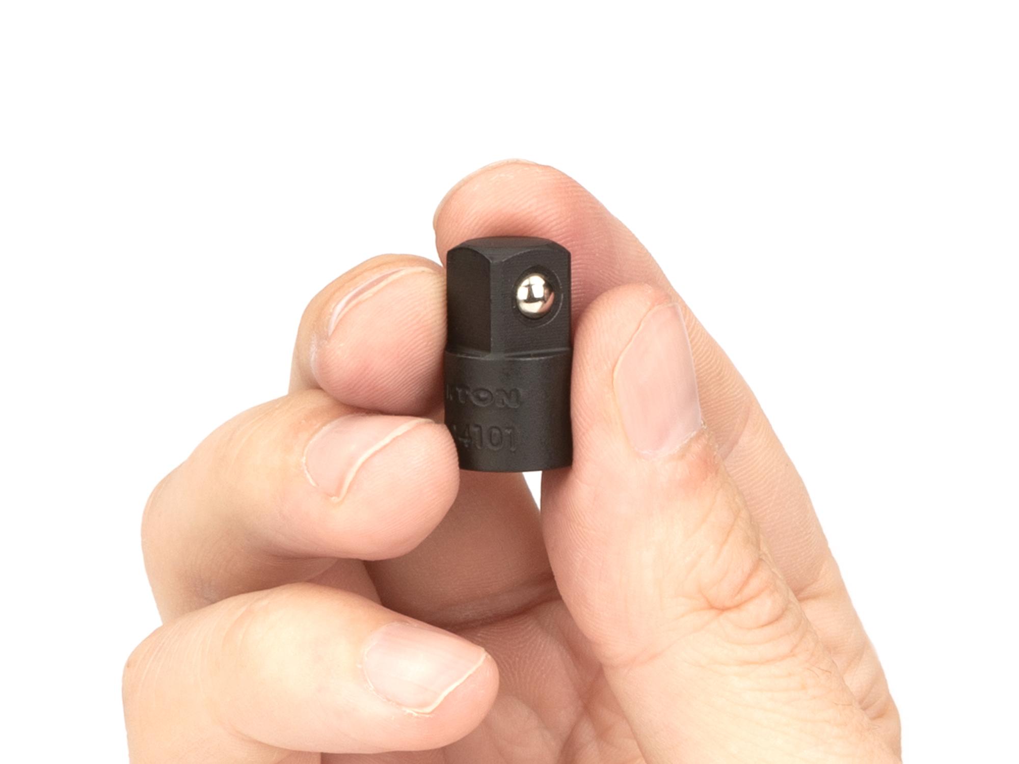 Person holding Tekton impact drive accessory. Item #SIA04101