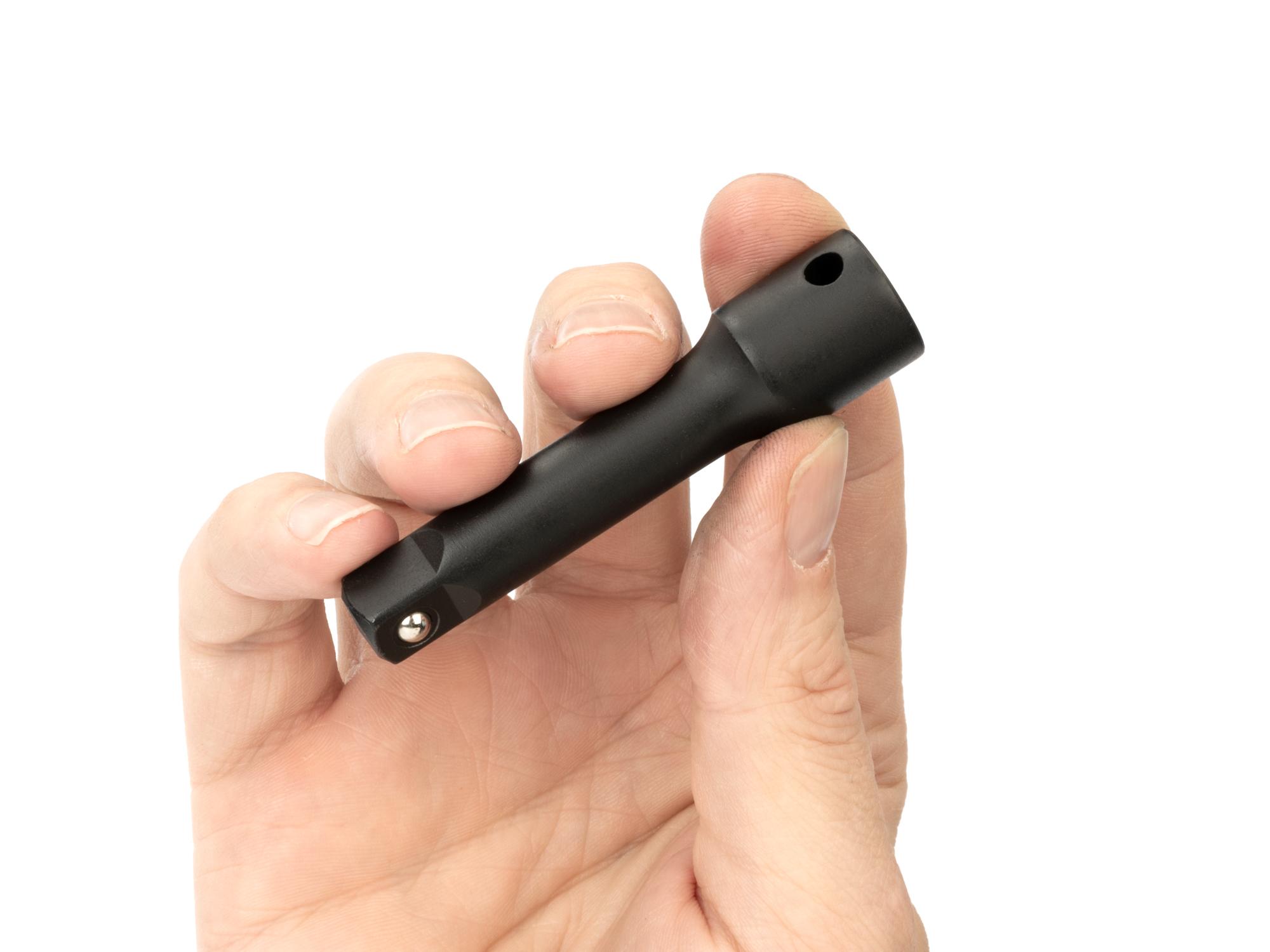 Person holding Tekton 3 inch impact drive accessory. Item #SIA11103