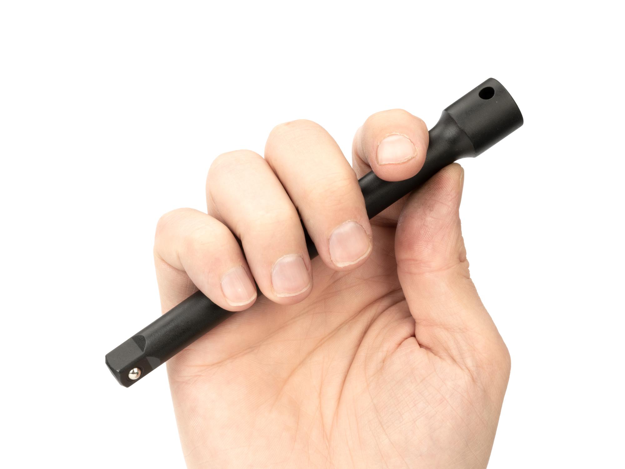 Person holding Tekton 6 inch impact drive accessory. Item #SIA11106