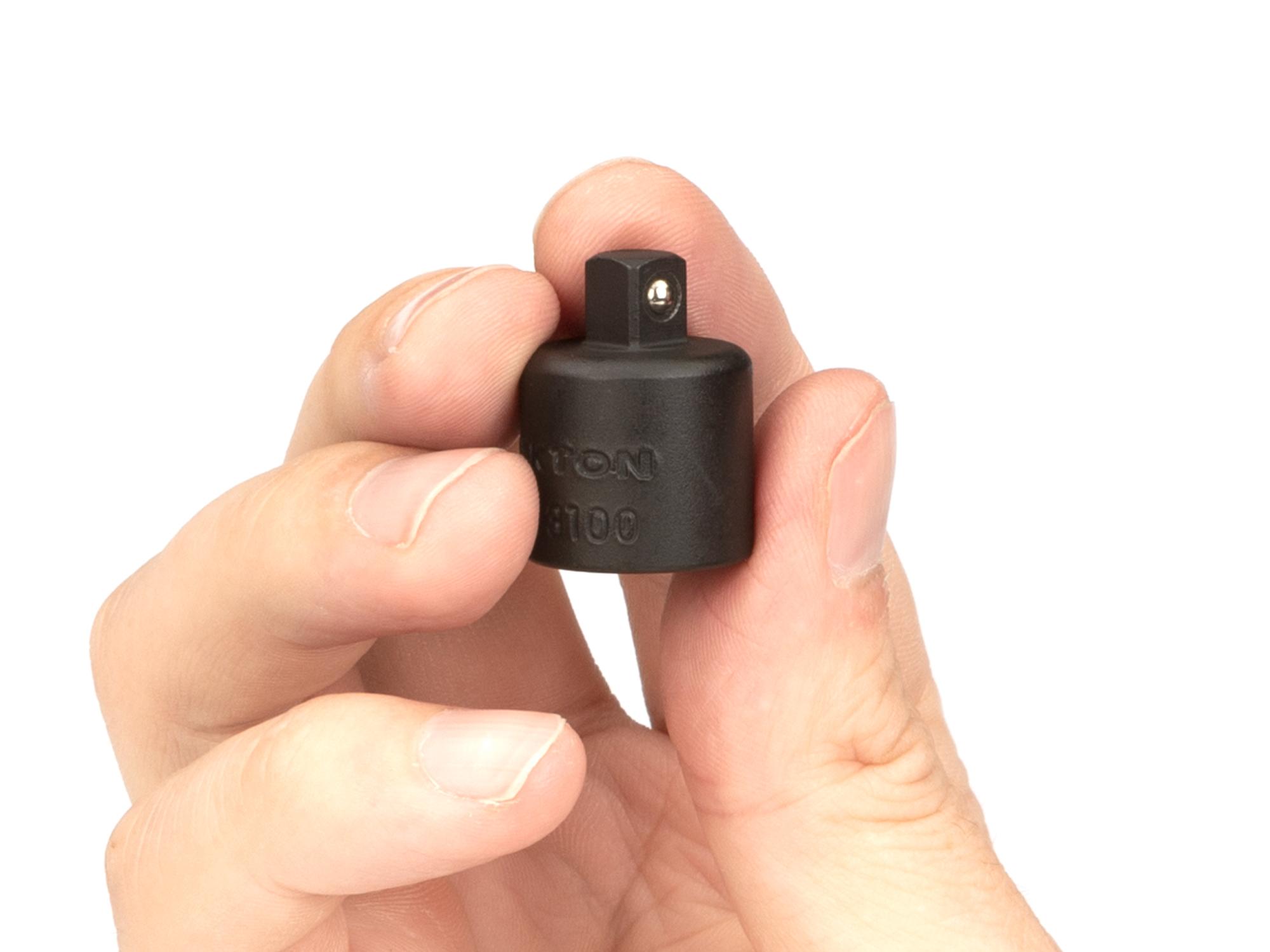 Person holding Tekton impact drive accessory. Item #SIA13100