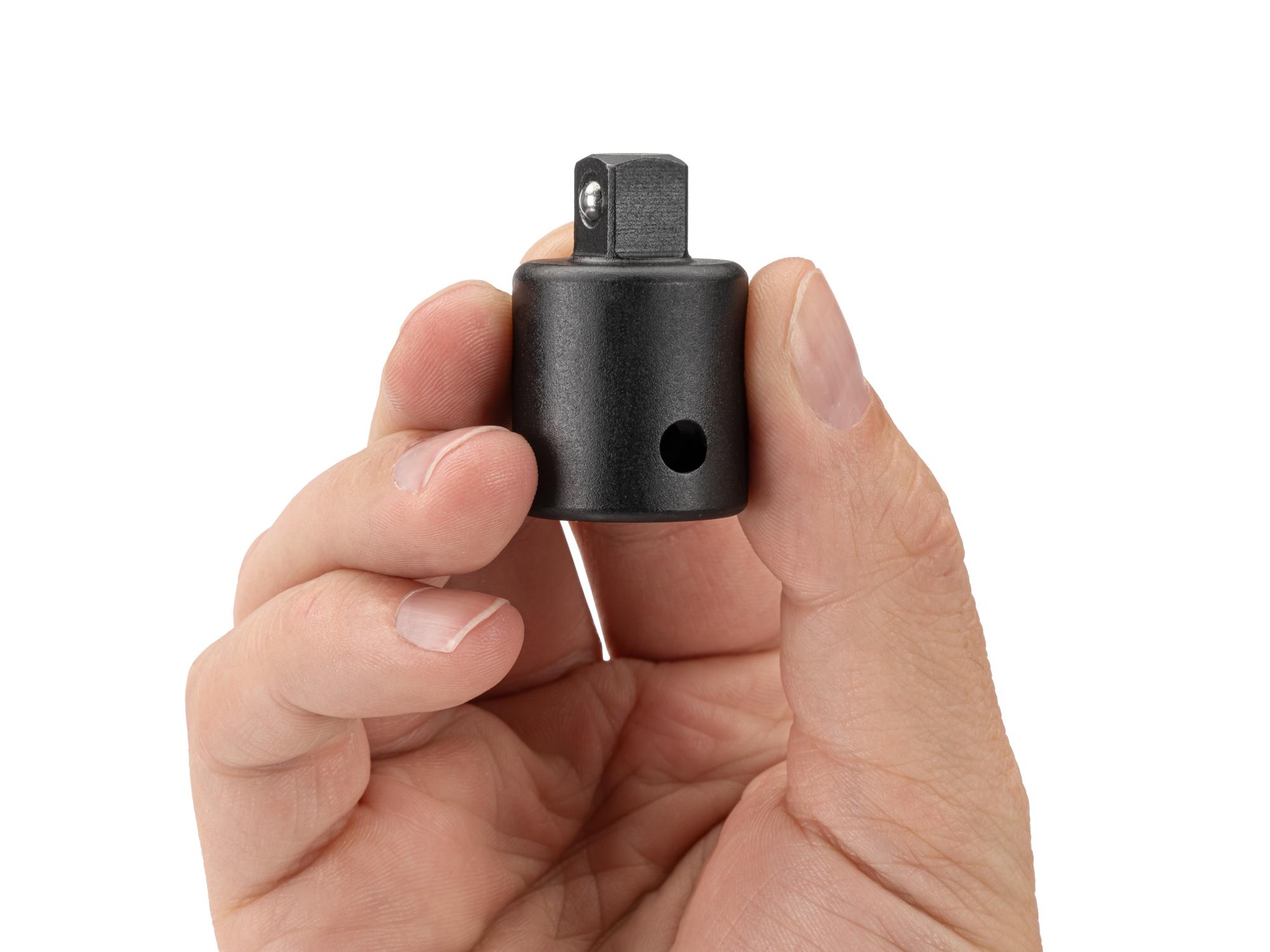 Person holding Tekton impact drive accessory. Item #SIA23101