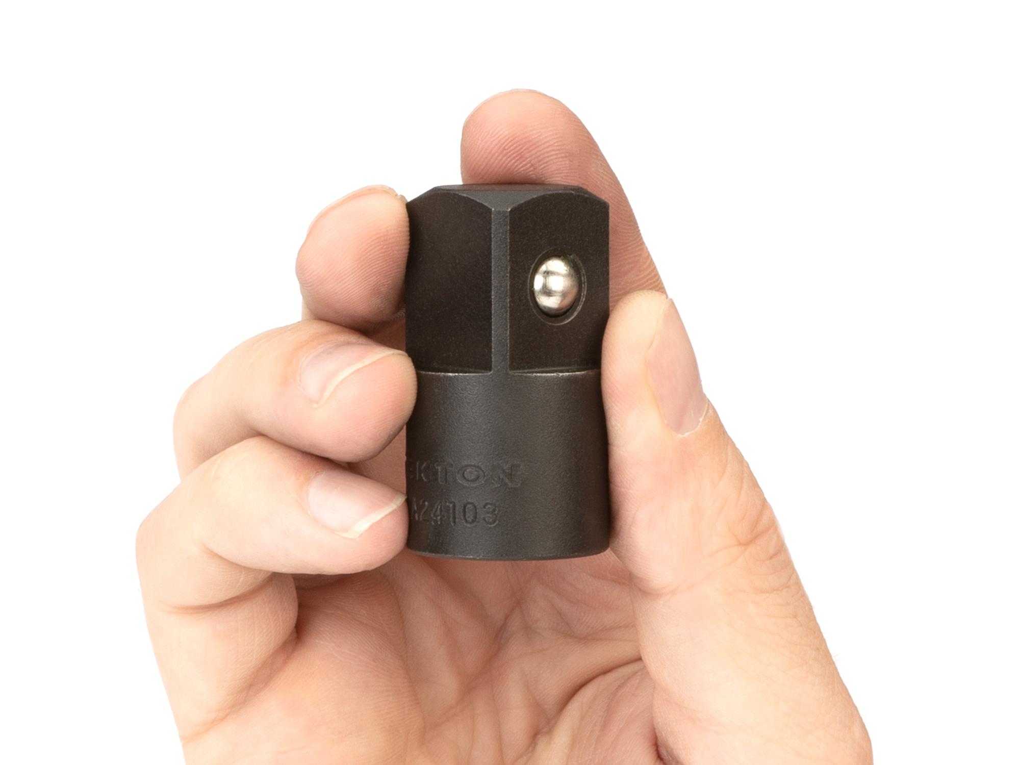 Person holding Tekton impact drive accessory. Item #SIA24103