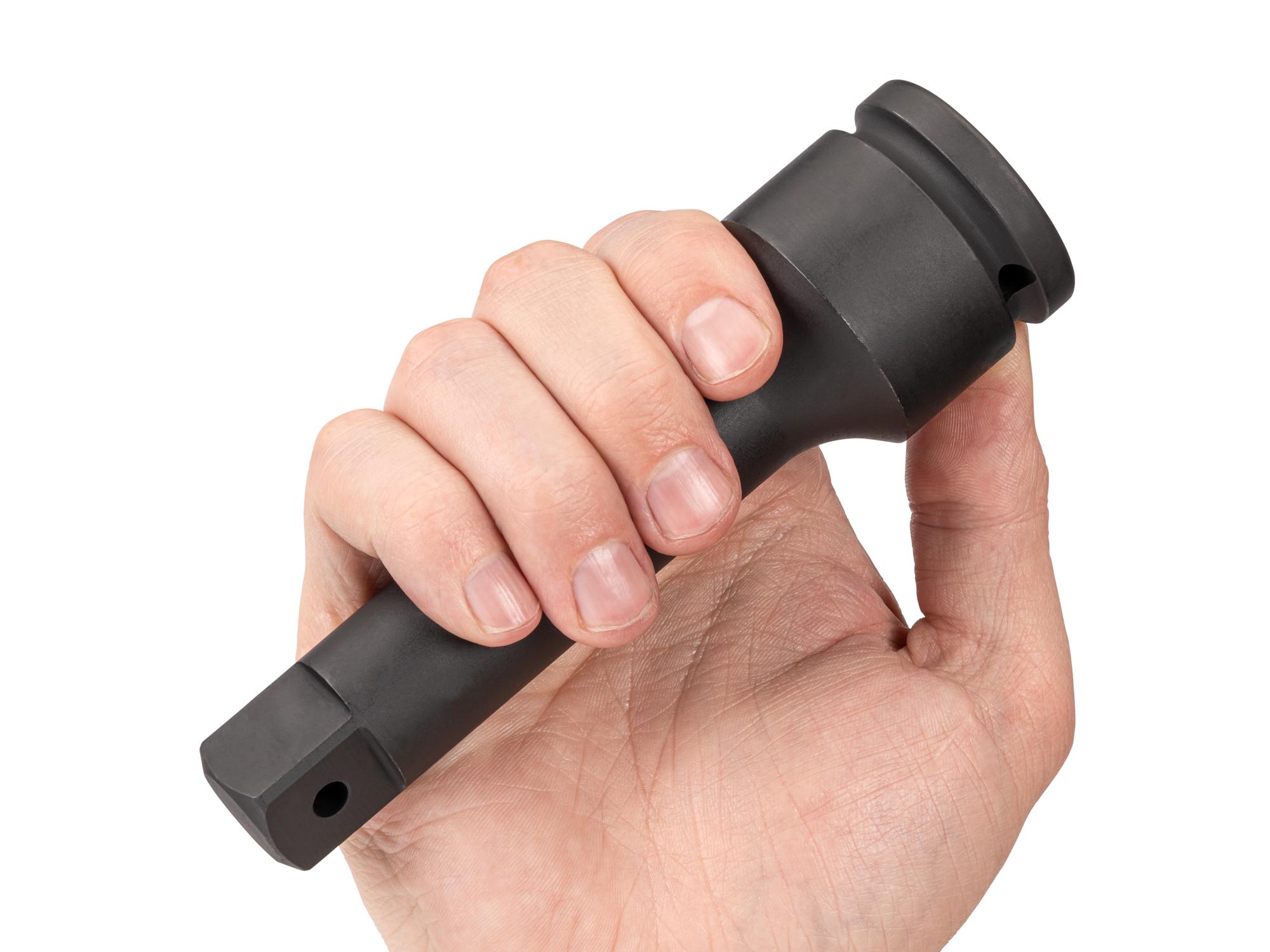 Person holding Tekton 6 inch impact drive accessory. Item #SIA31006