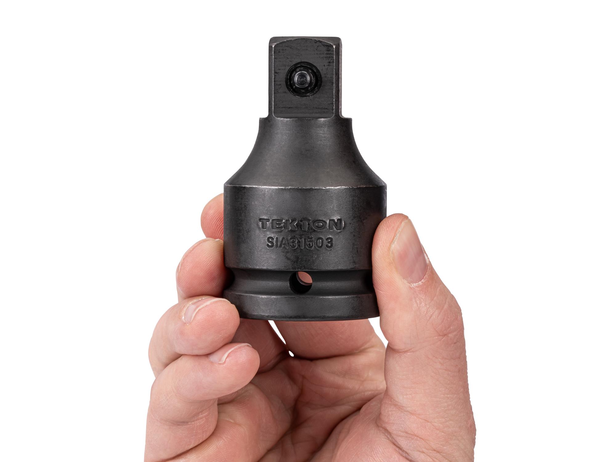 Person holding Tekton 3 inch impact drive accessory. Item #SIA31503