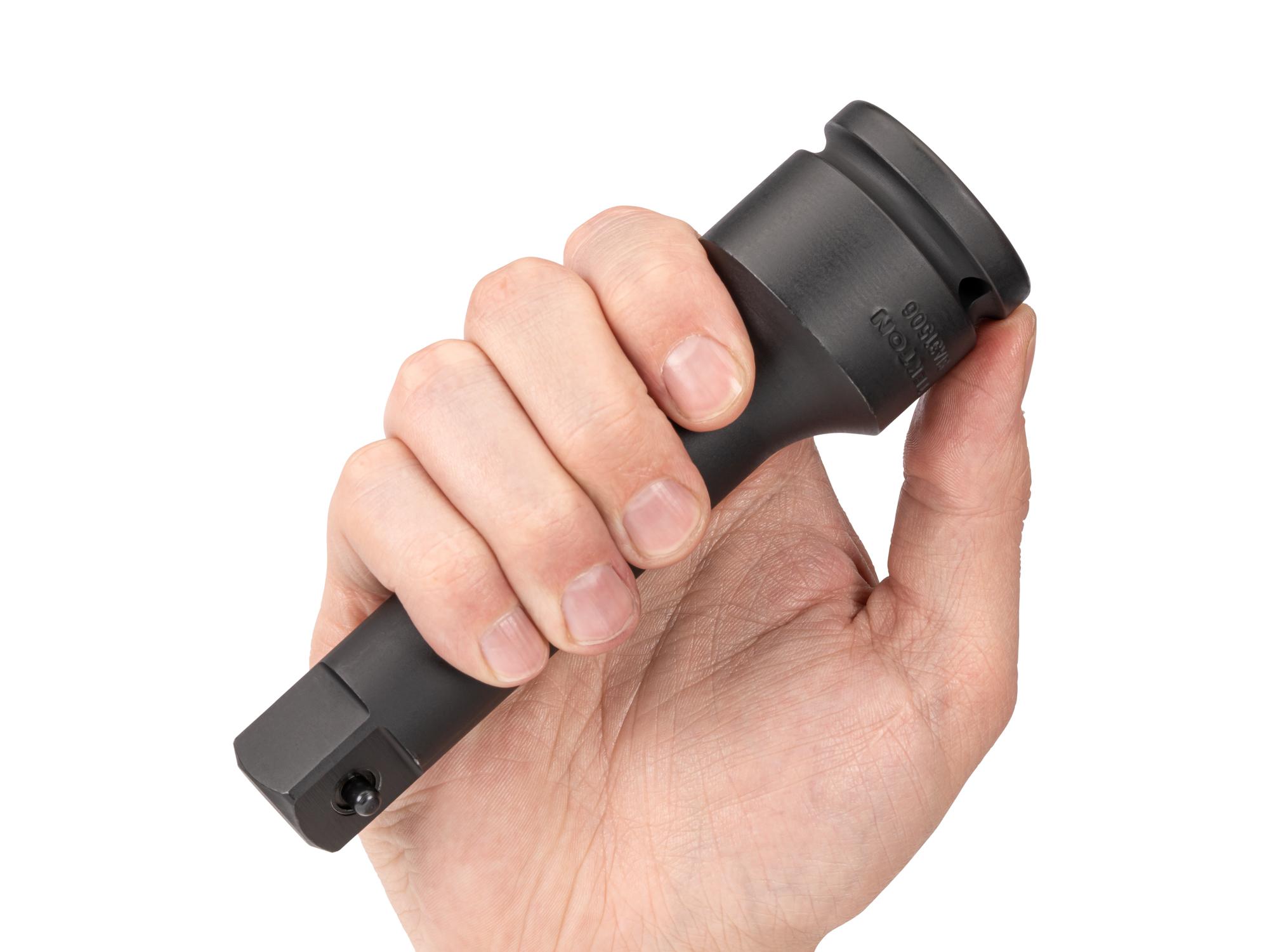 Person holding Tekton 6 inch impact drive accessory. Item #SIA31506