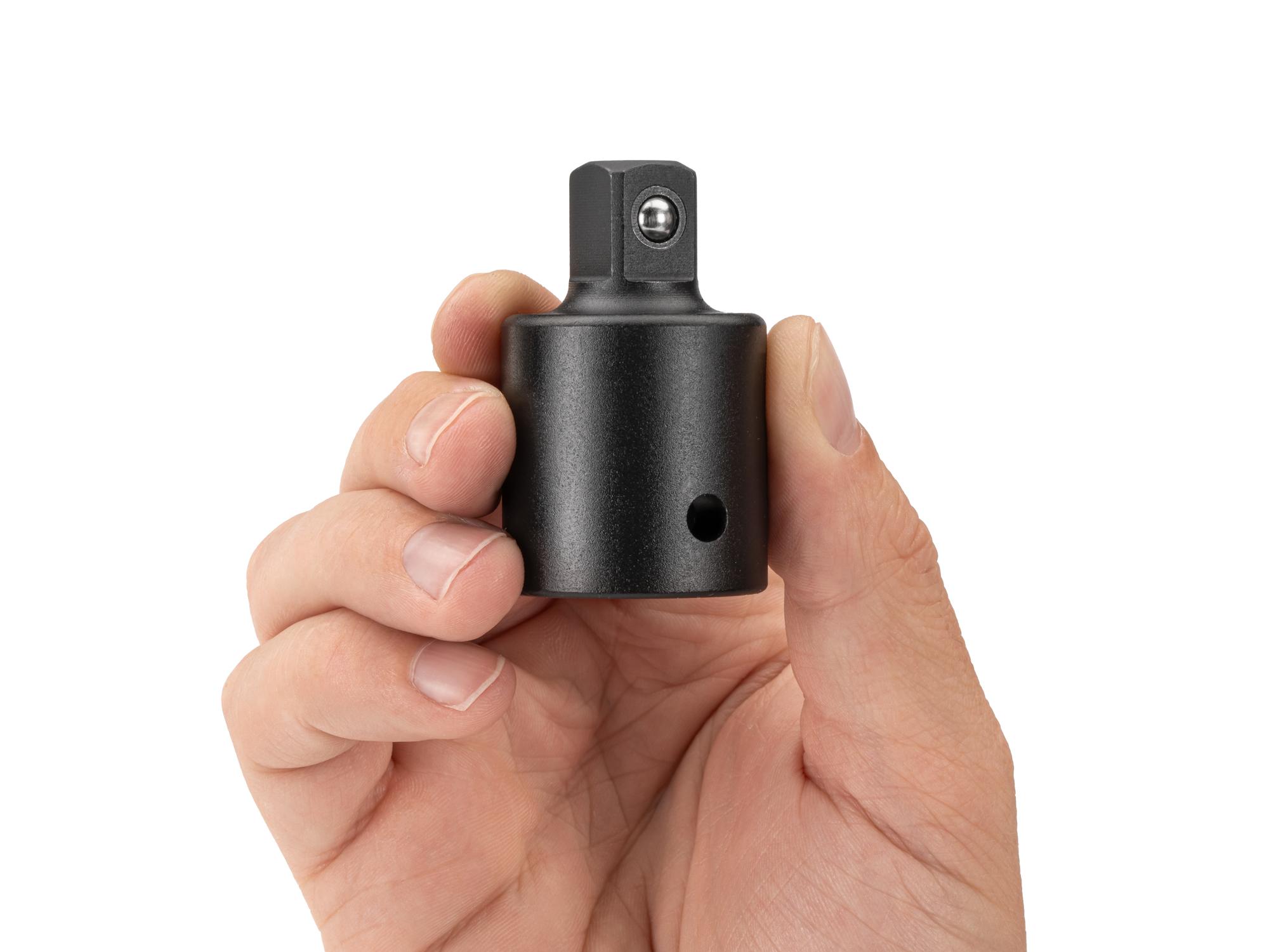 Person holding Tekton impact drive accessory. Item #SIA33102