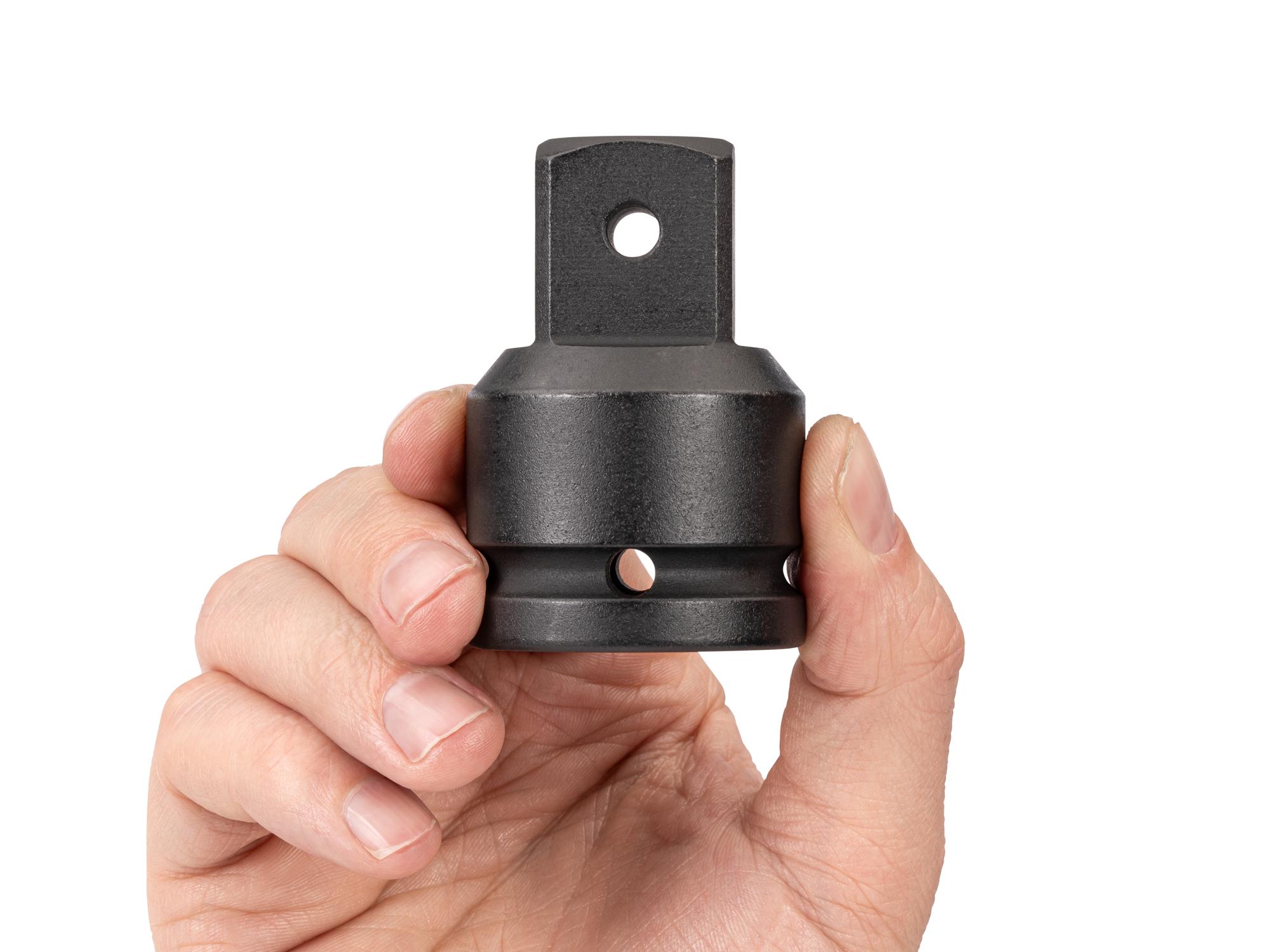 Person holding Tekton impact drive accessory. Item #SIA34014