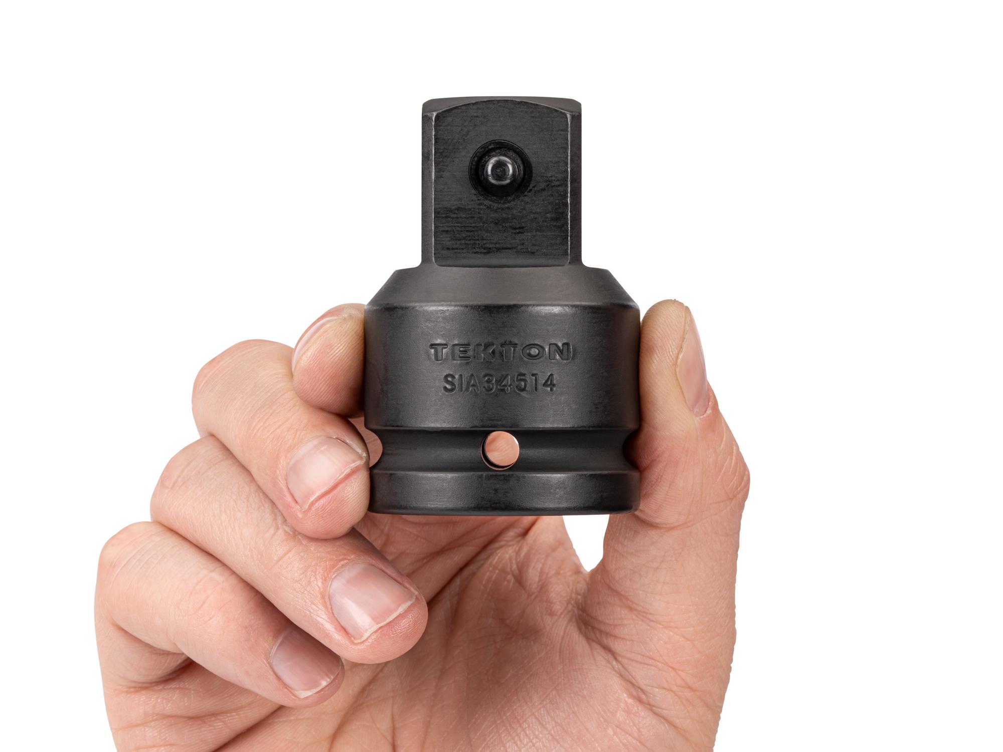 Person holding Tekton impact drive accessory. Item #SIA34514