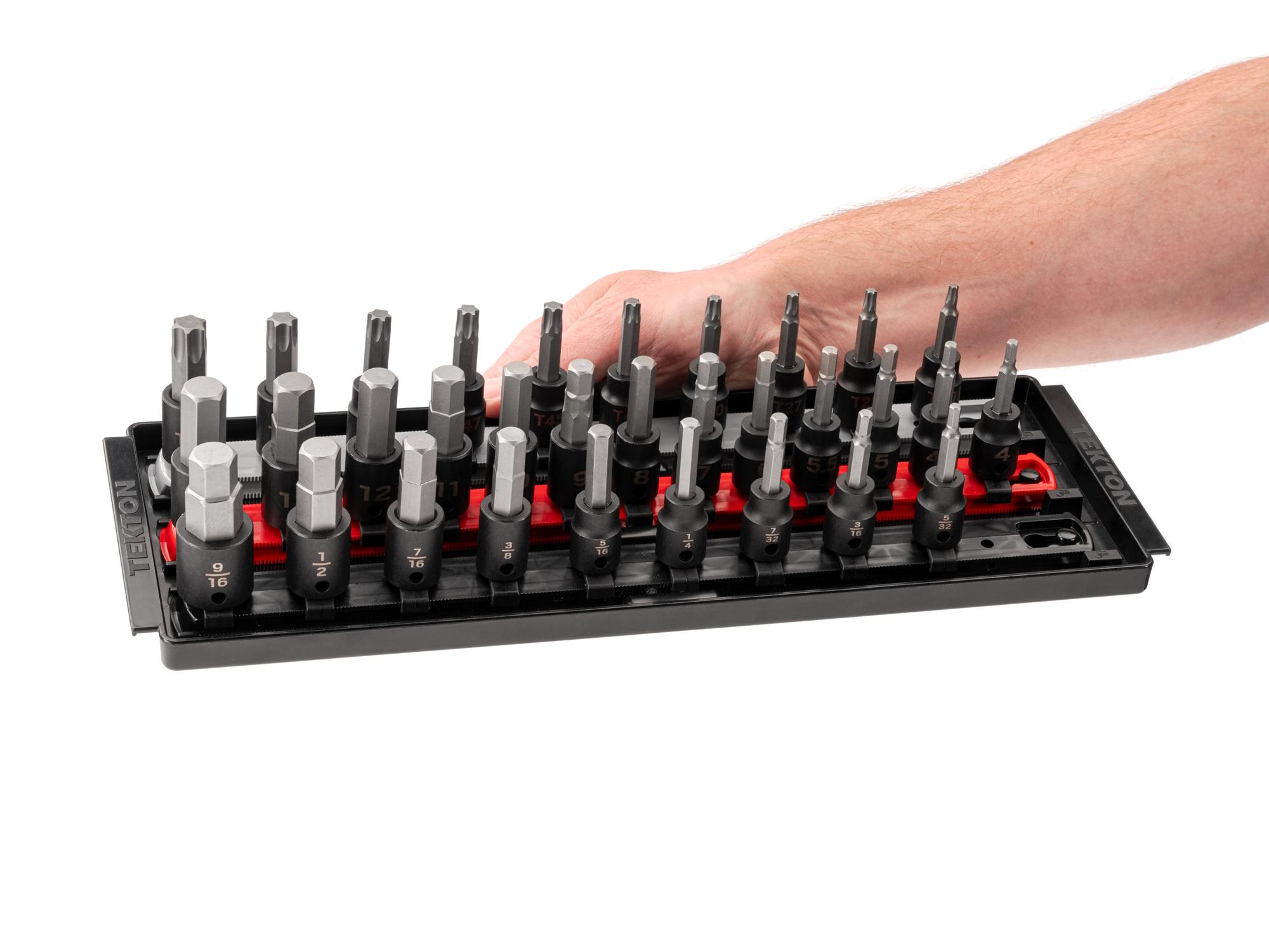Person holding Tekton rail and tray impact drive bit socket set. Item #SIB91202