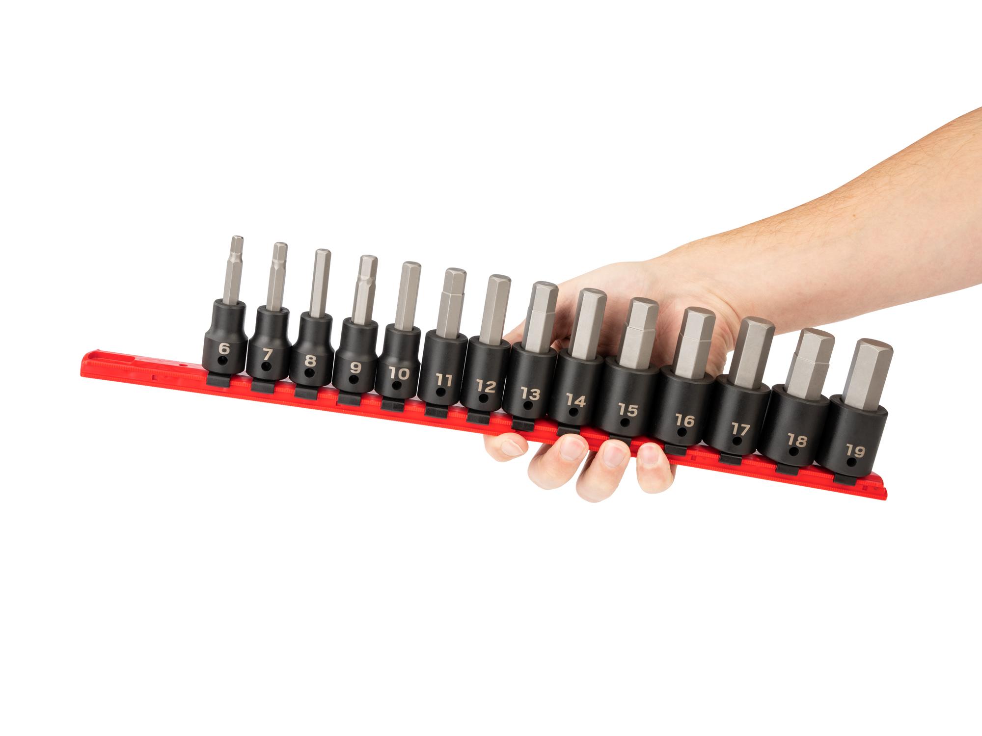 Person holding Tekton rail impact drive bit socket set. Item #SIB92101