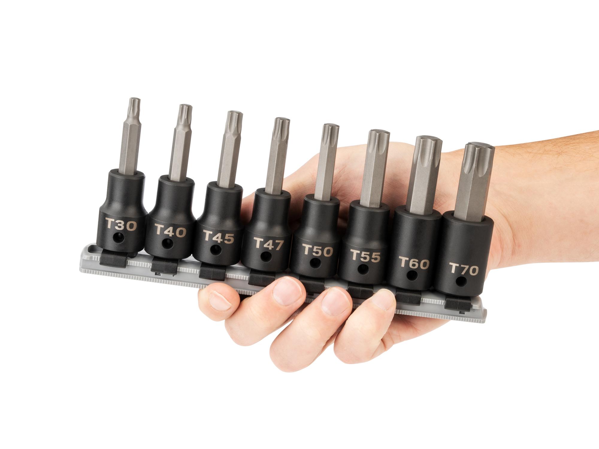 Person holding Tekton rail impact drive bit socket set. Item #SIB92102