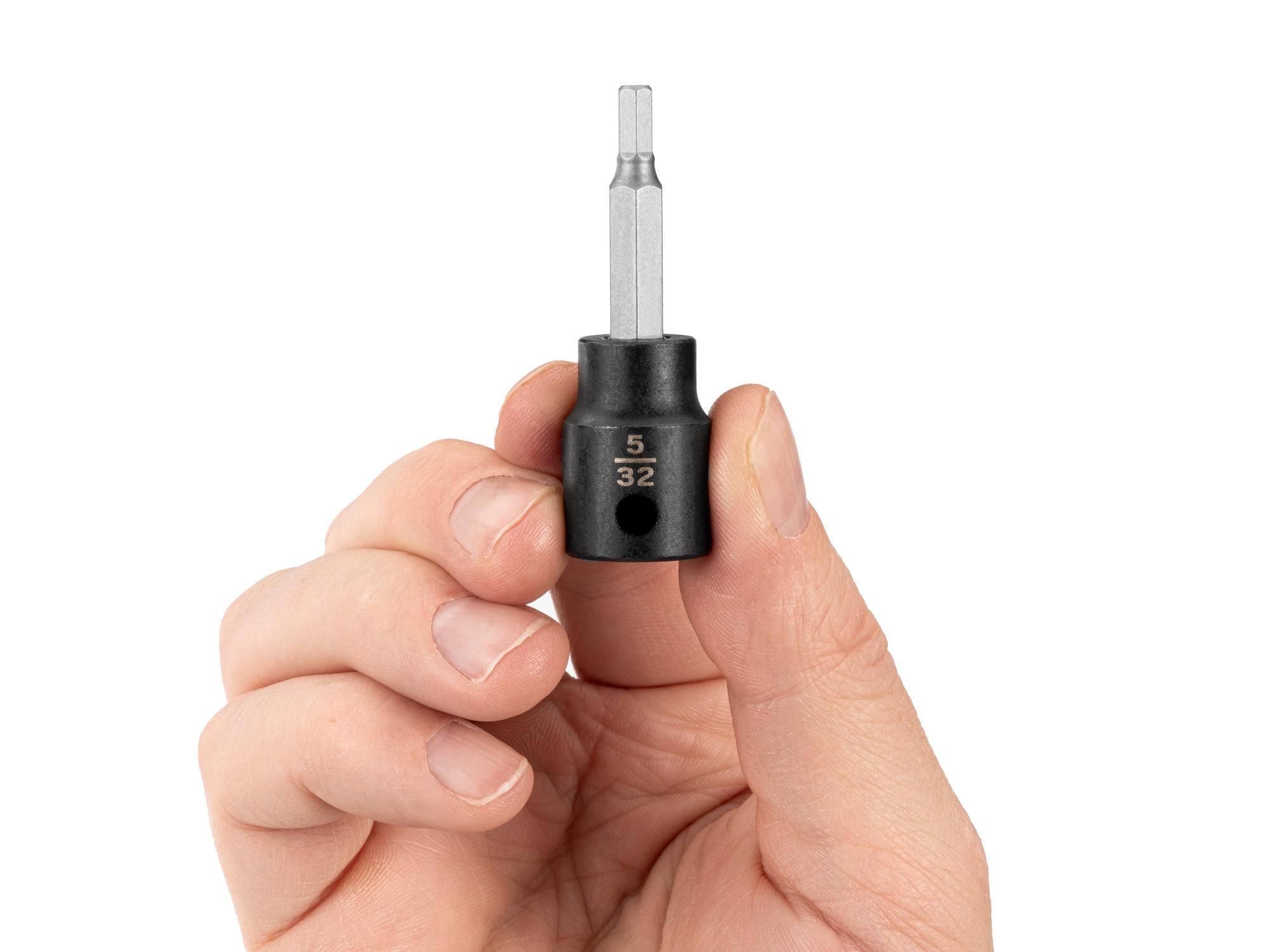 Person holding Tekton impact drive bit socket. Item #SIB12202