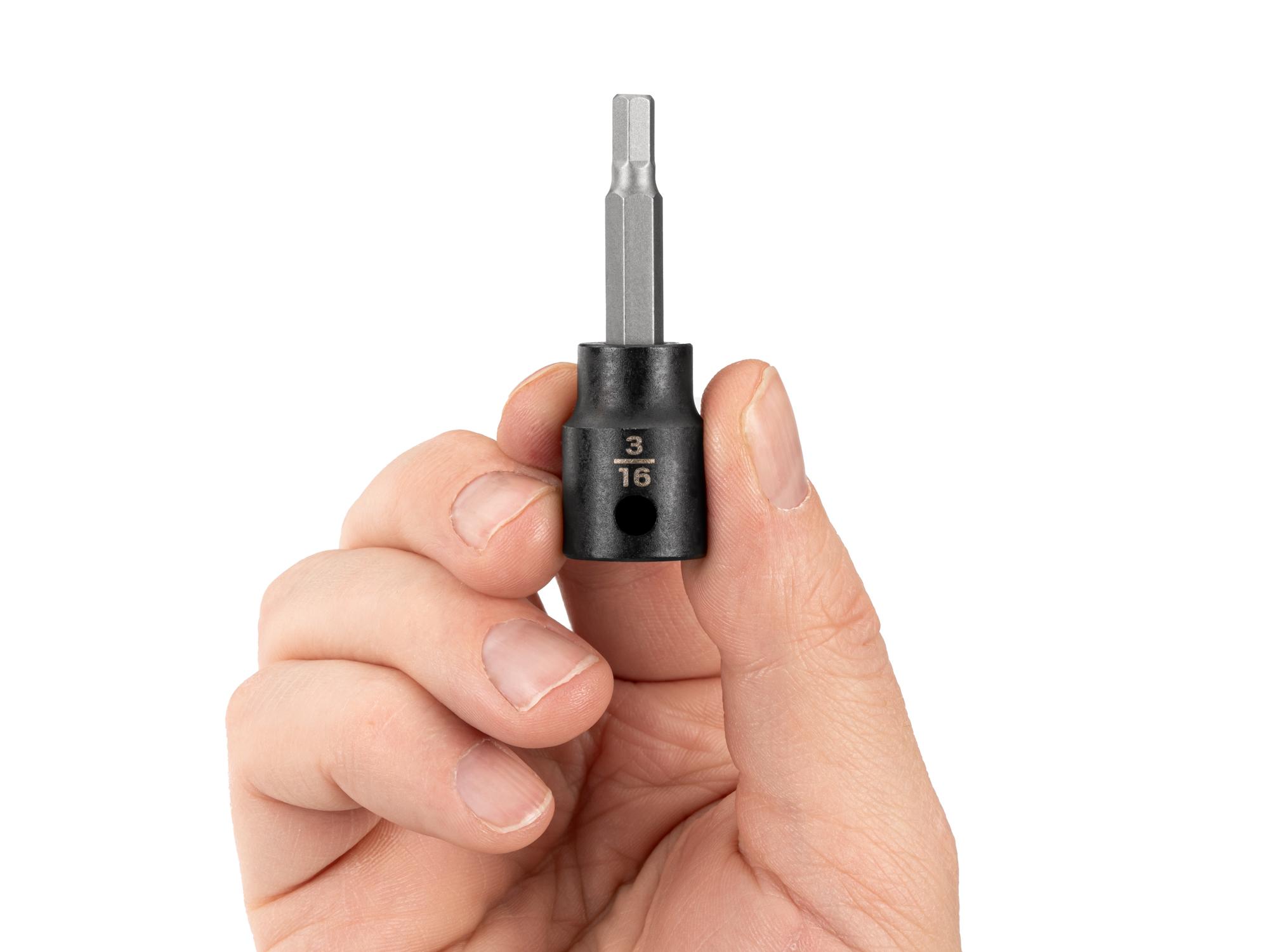 Person holding Tekton impact drive bit socket. Item #SIB12203