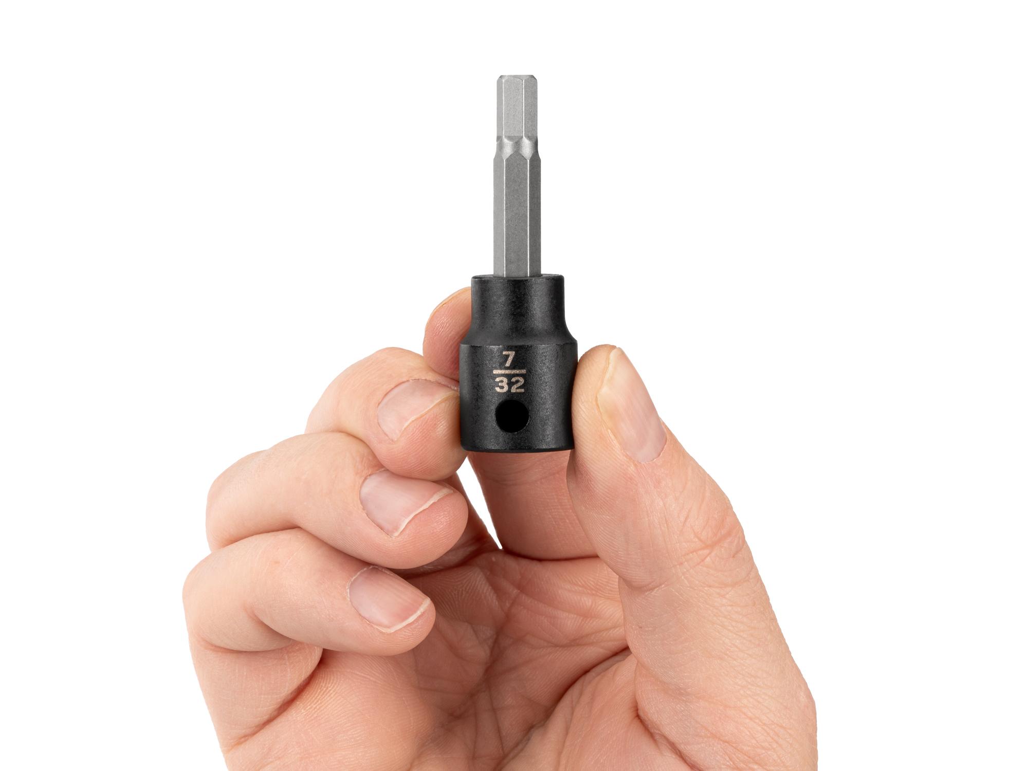 Person holding Tekton impact drive bit socket. Item #SIB12205