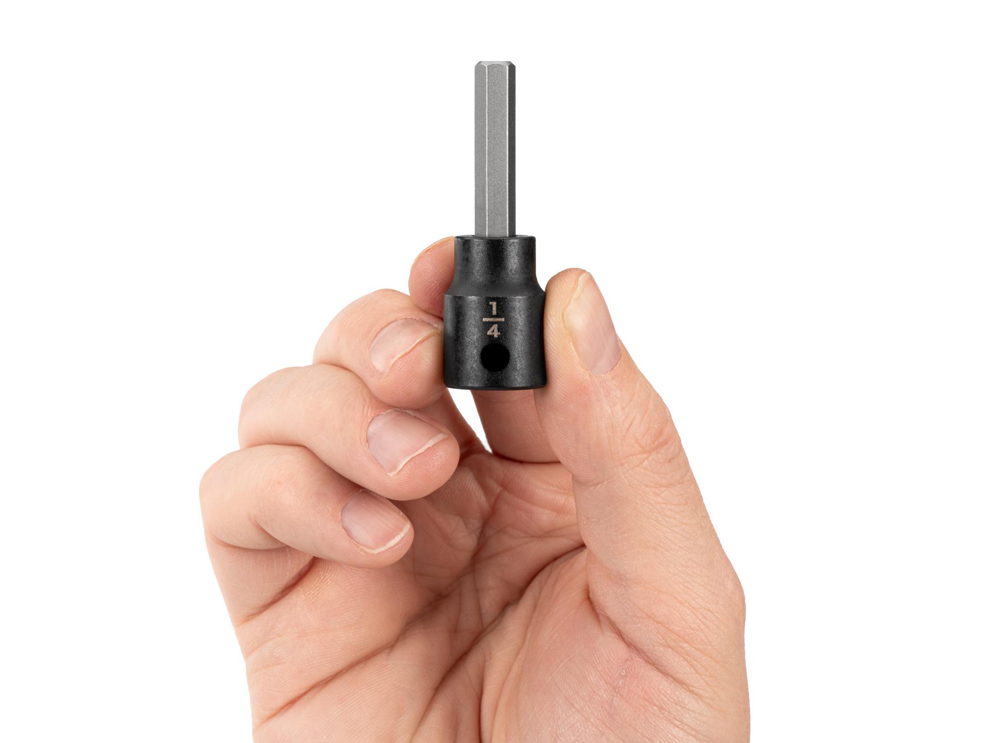 Person holding Tekton impact drive bit socket. Item #SIB12206