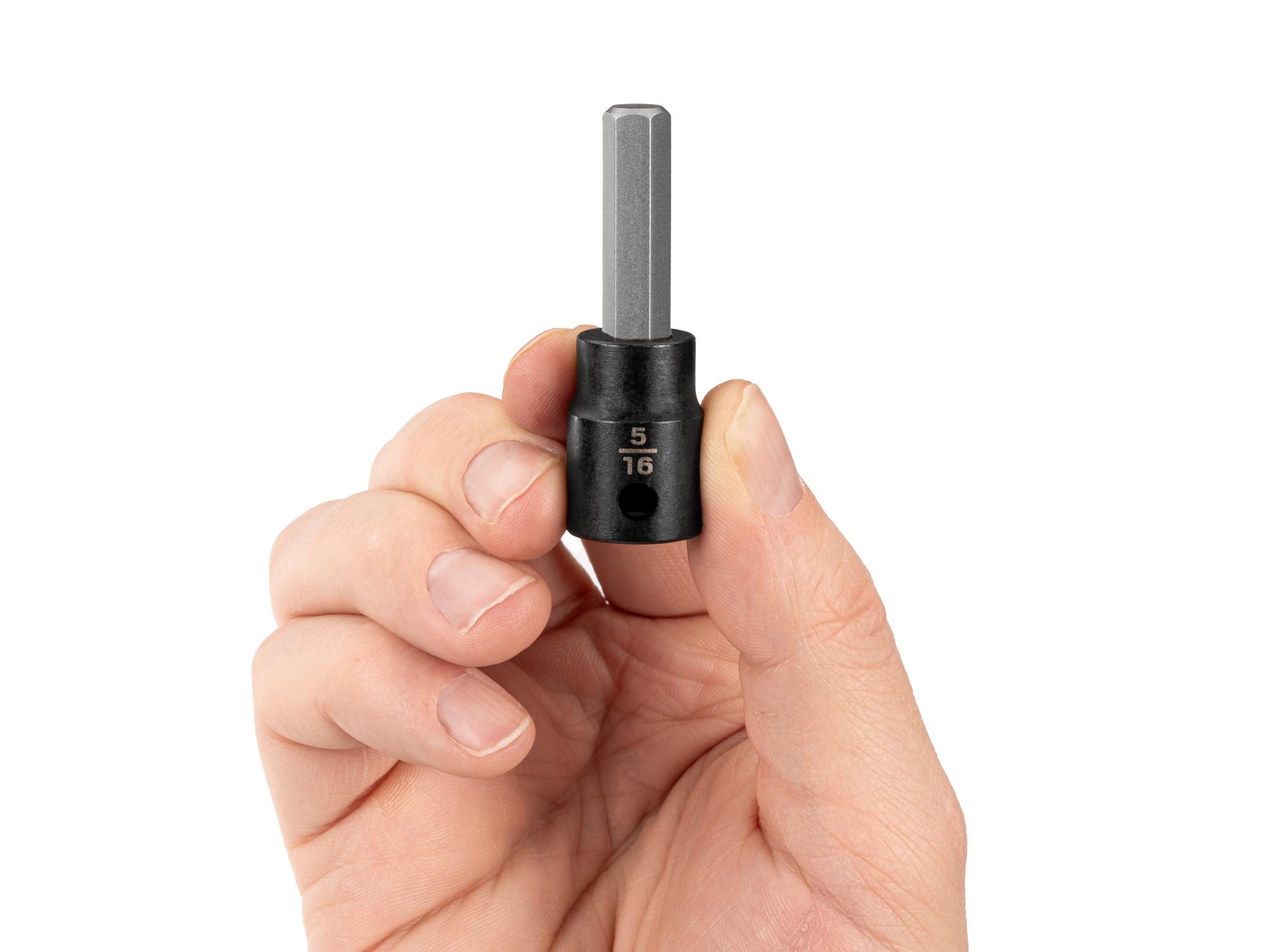 Person holding Tekton impact drive bit socket. Item #SIB12208