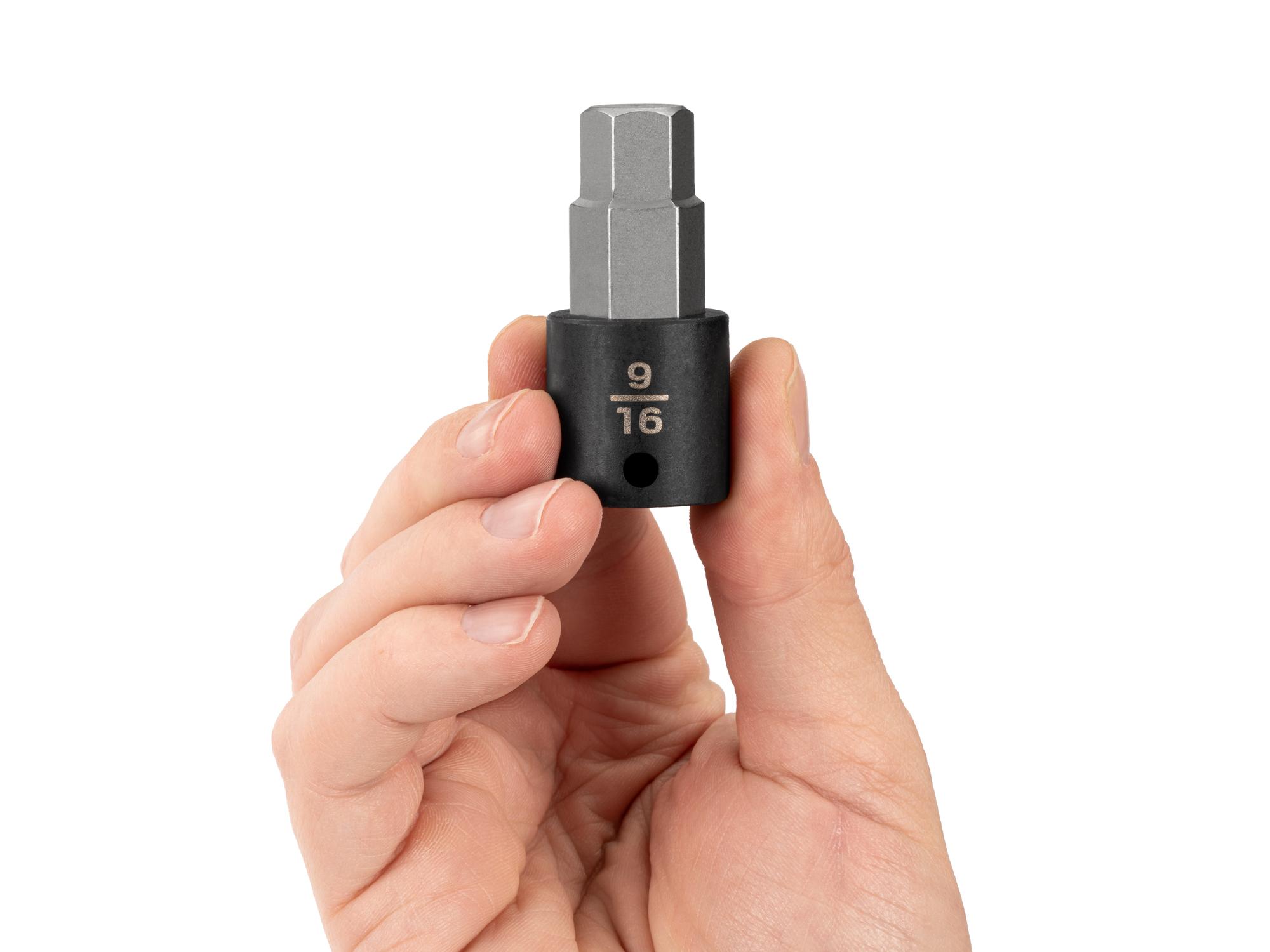 Person holding Tekton impact drive bit socket. Item #SIB12214