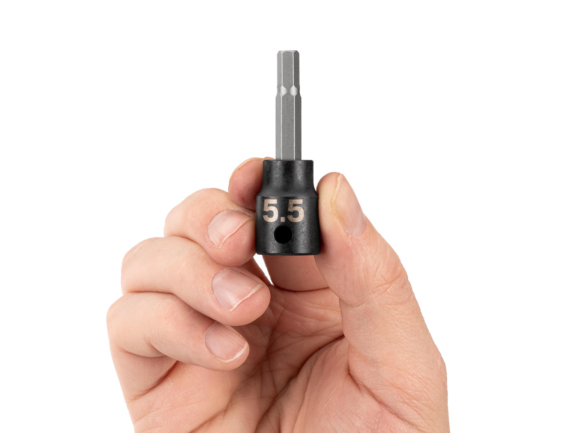 Person holding Tekton impact drive bit socket. Item #SIB13205