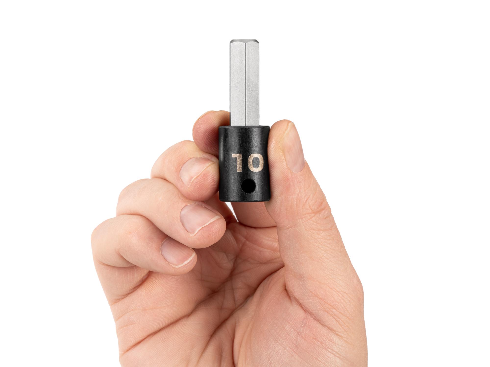 Person holding Tekton impact drive bit socket. Item #SIB13210