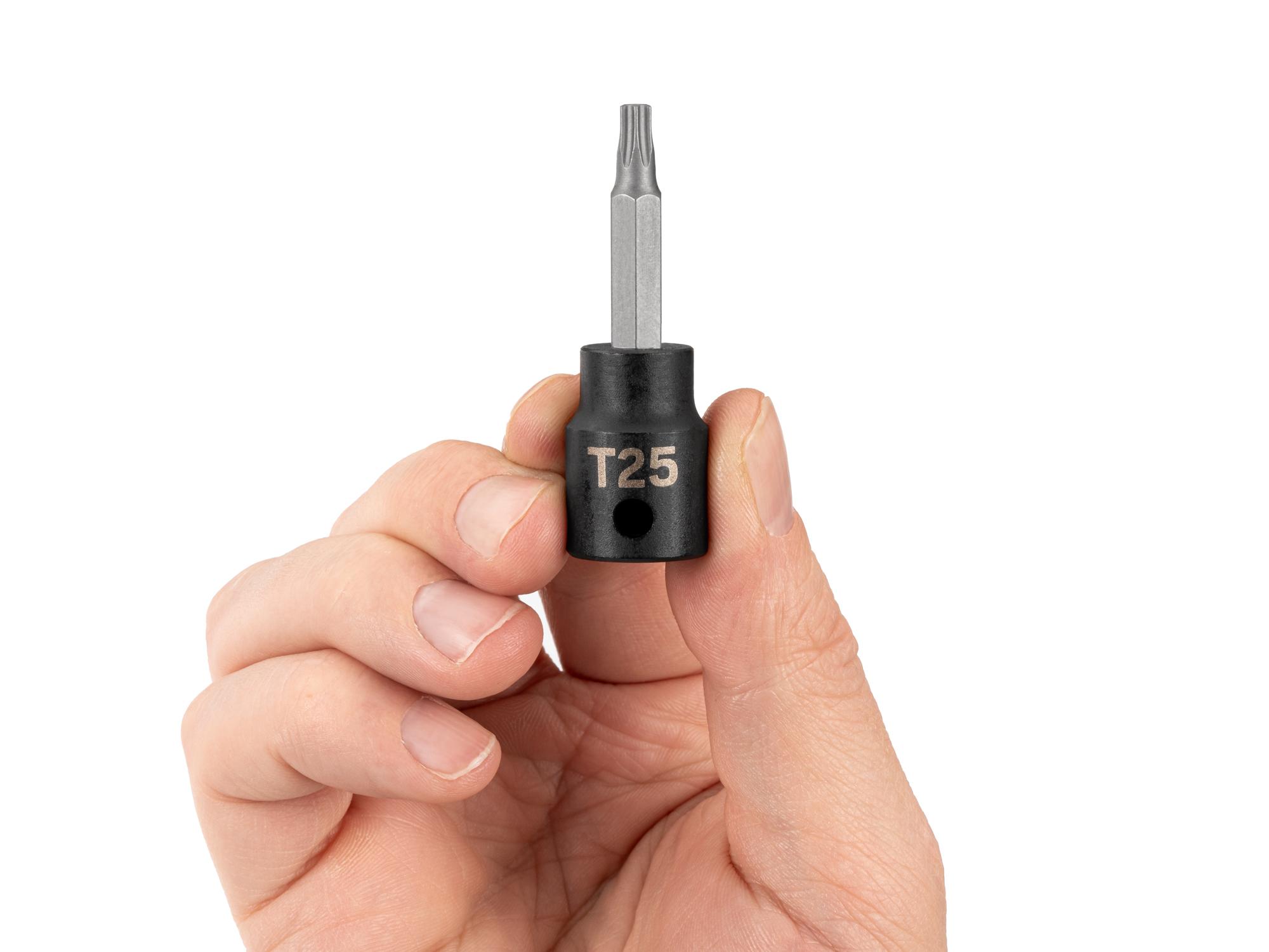 Person holding Tekton impact drive bit socket. Item #SIB14225