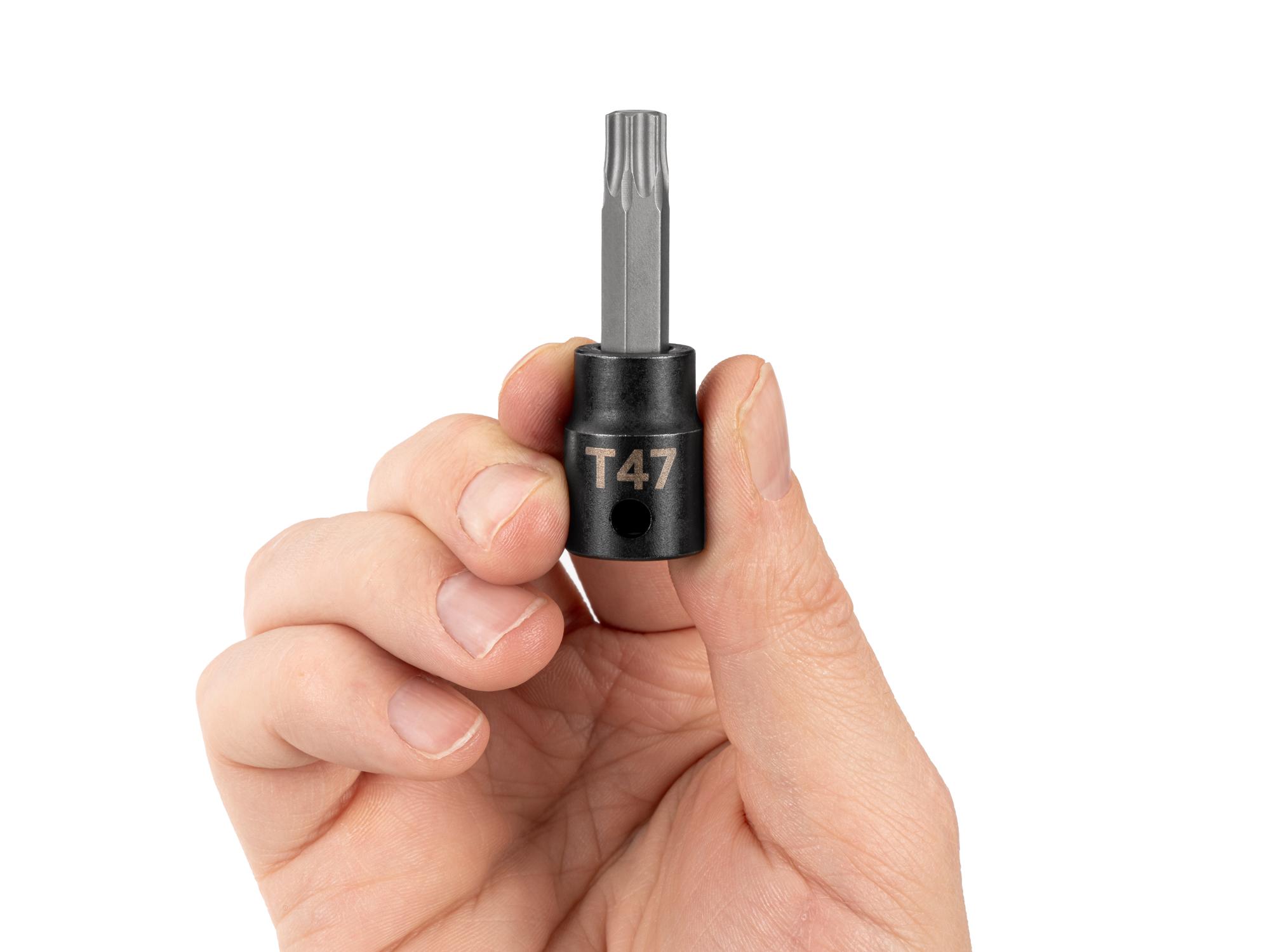 Person holding Tekton impact drive bit socket. Item #SIB14247