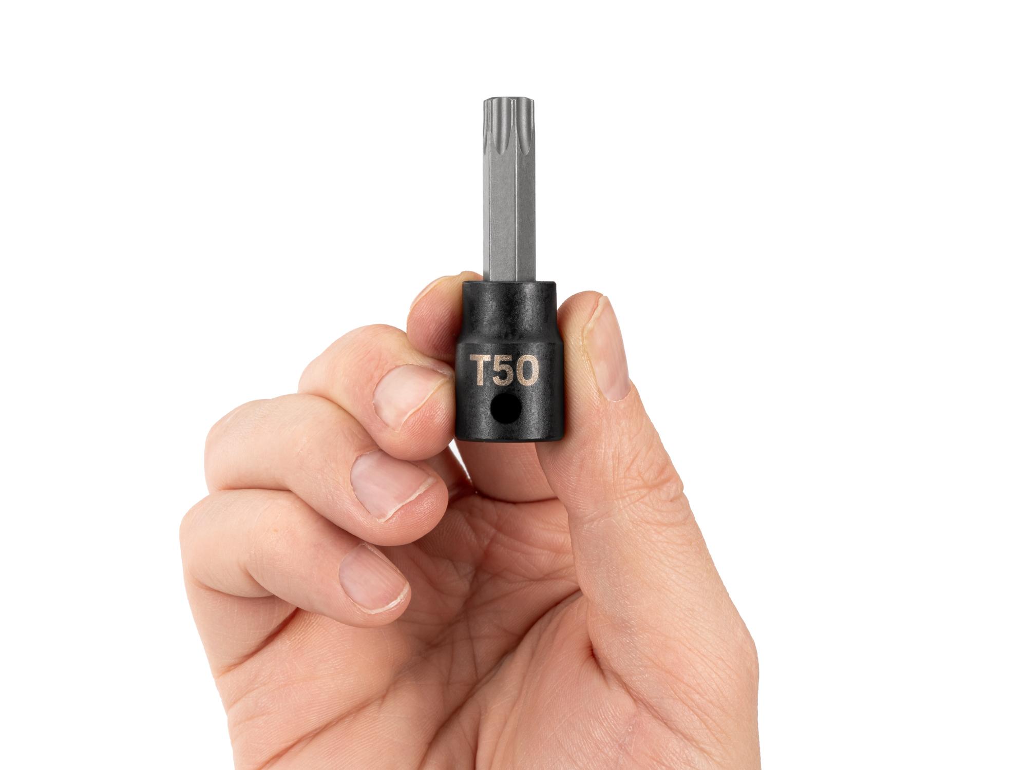 Person holding Tekton impact drive bit socket. Item #SIB14250
