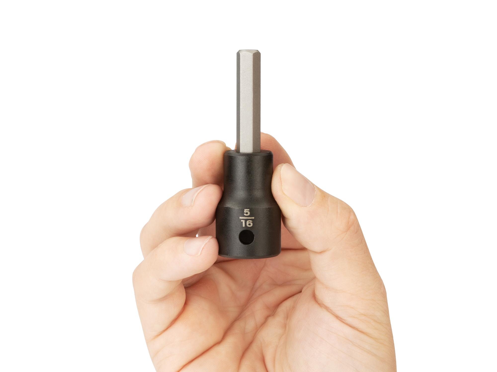 Person holding Tekton impact drive bit socket. Item #SIB22208