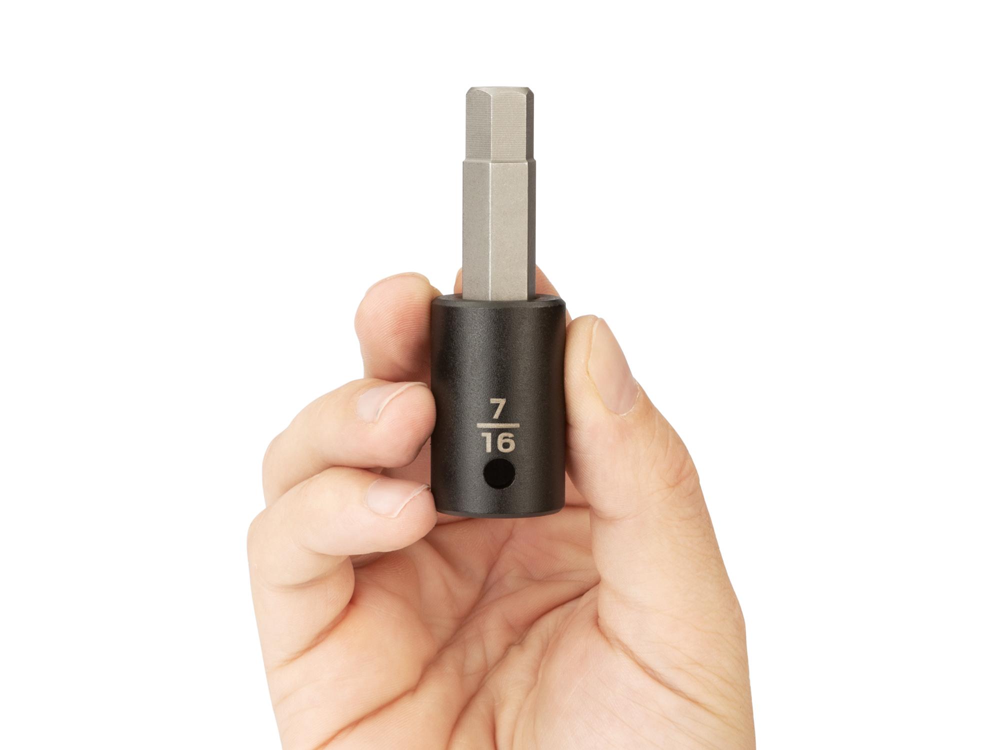 Person holding Tekton impact drive bit socket. Item #SIB22211