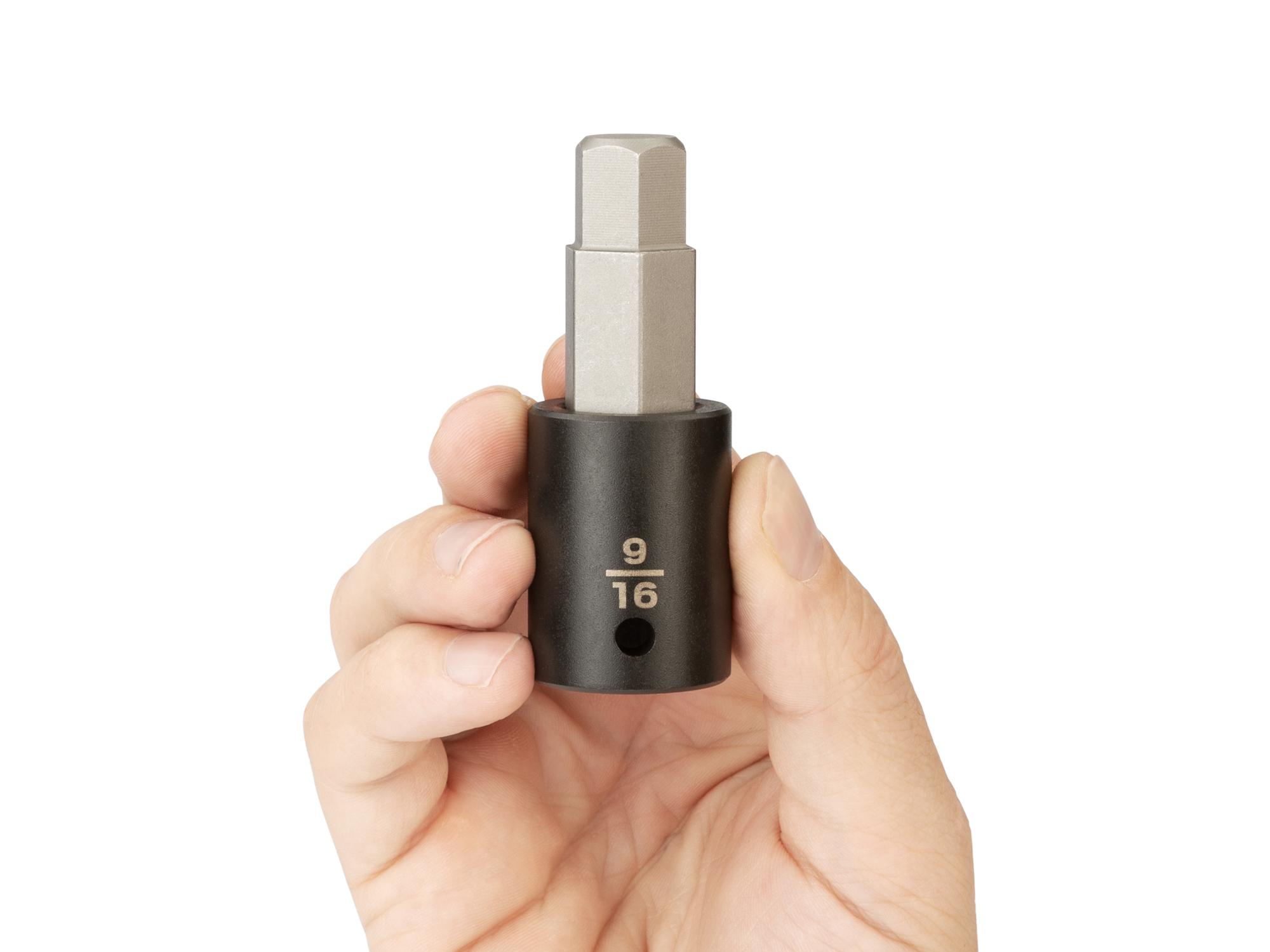 Person holding Tekton impact drive bit socket. Item #SIB22214