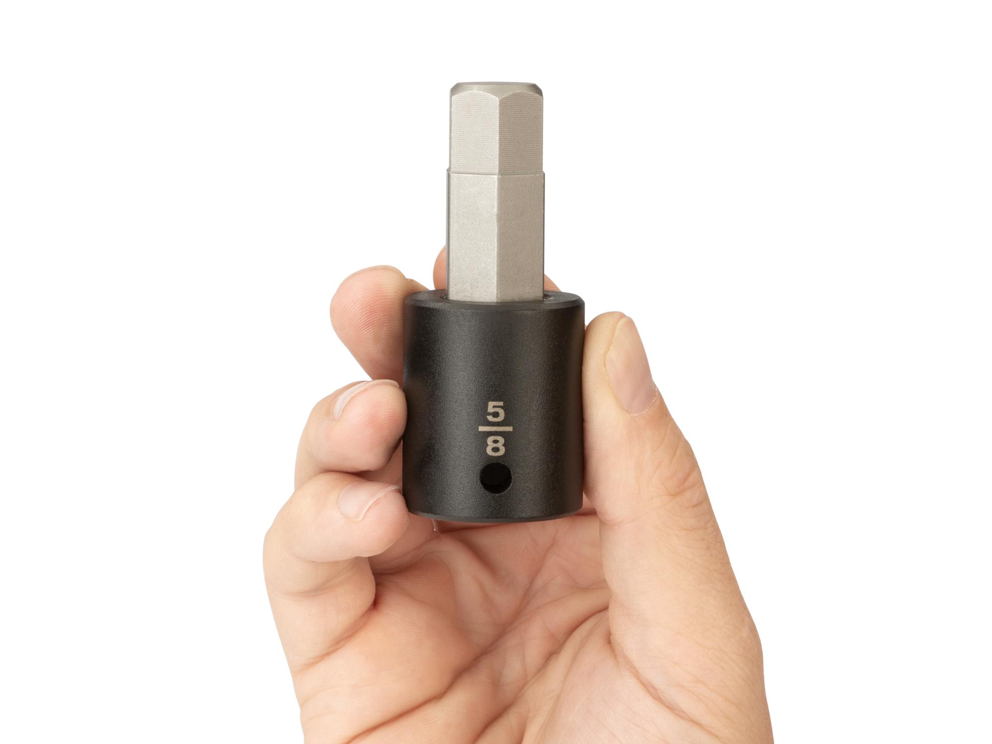 Person holding Tekton impact drive bit socket. Item #SIB22216