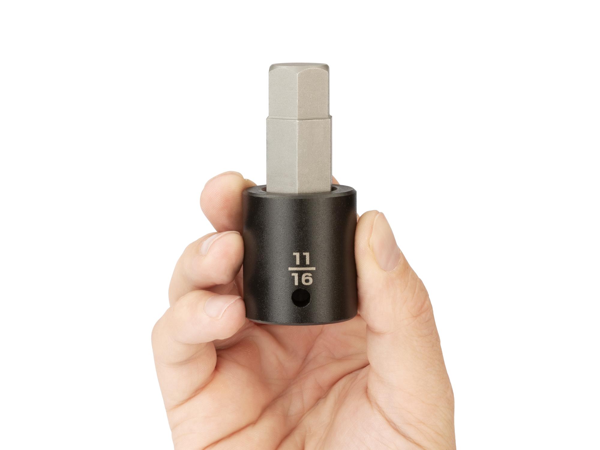 Person holding Tekton impact drive bit socket. Item #SIB22217