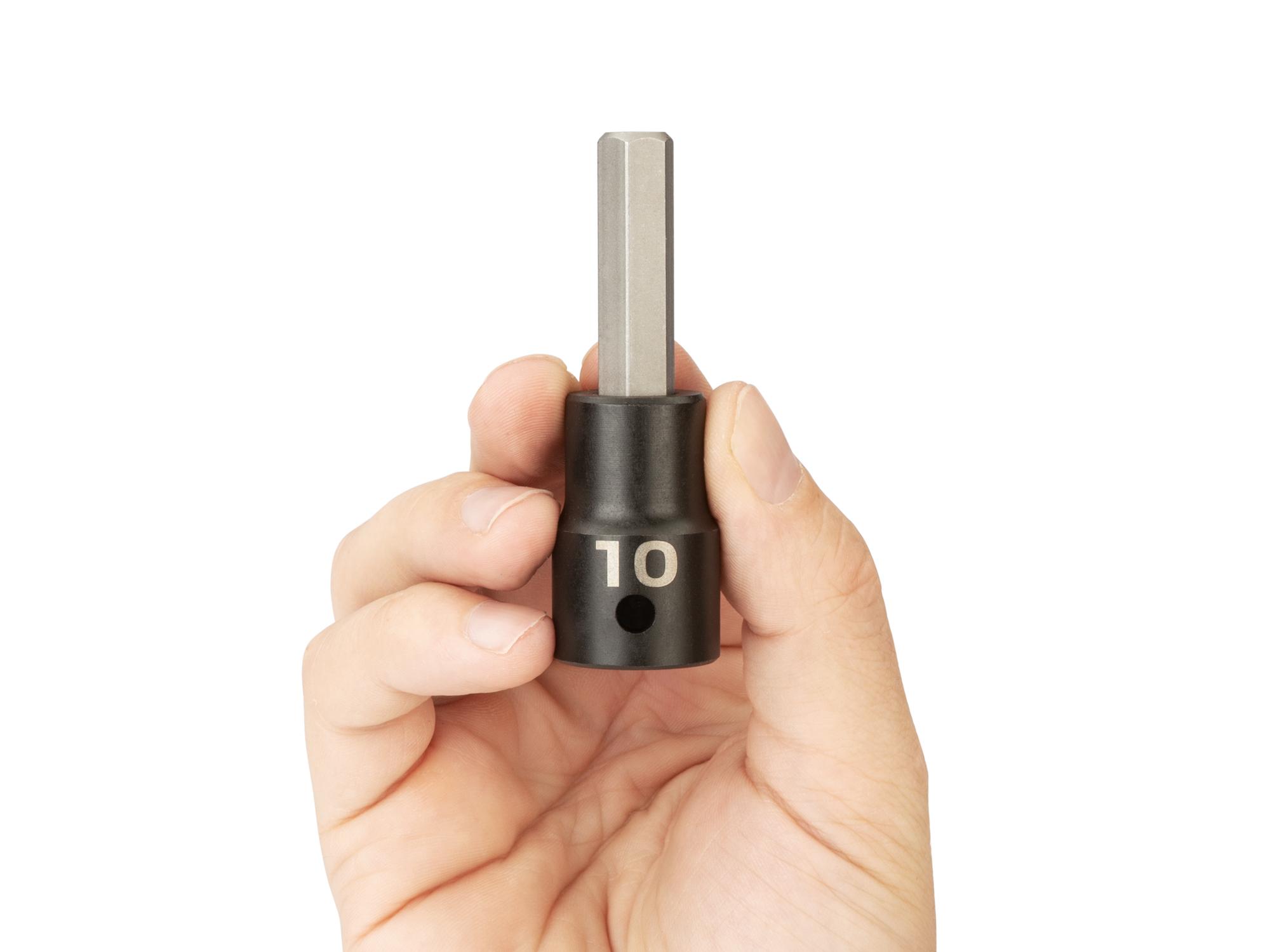 Person holding Tekton impact drive bit socket. Item #SIB23210