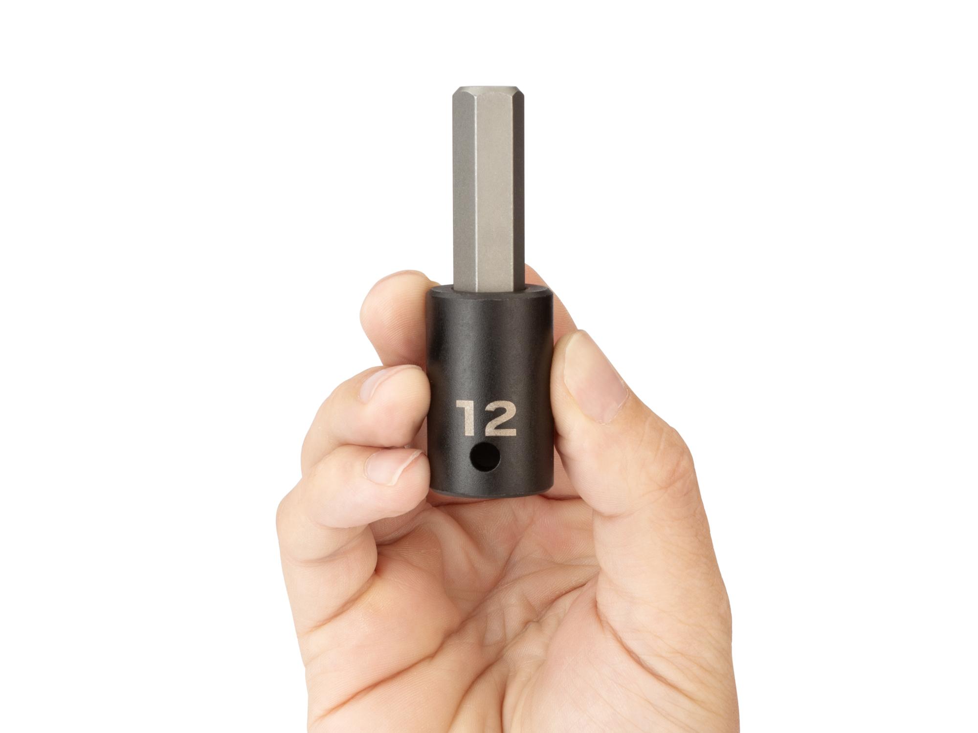 Person holding Tekton impact drive bit socket. Item #SIB23212