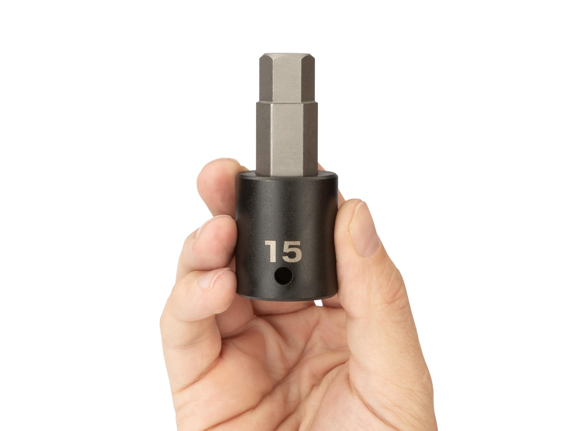 Person holding Tekton impact drive bit socket. Item #SIB23215