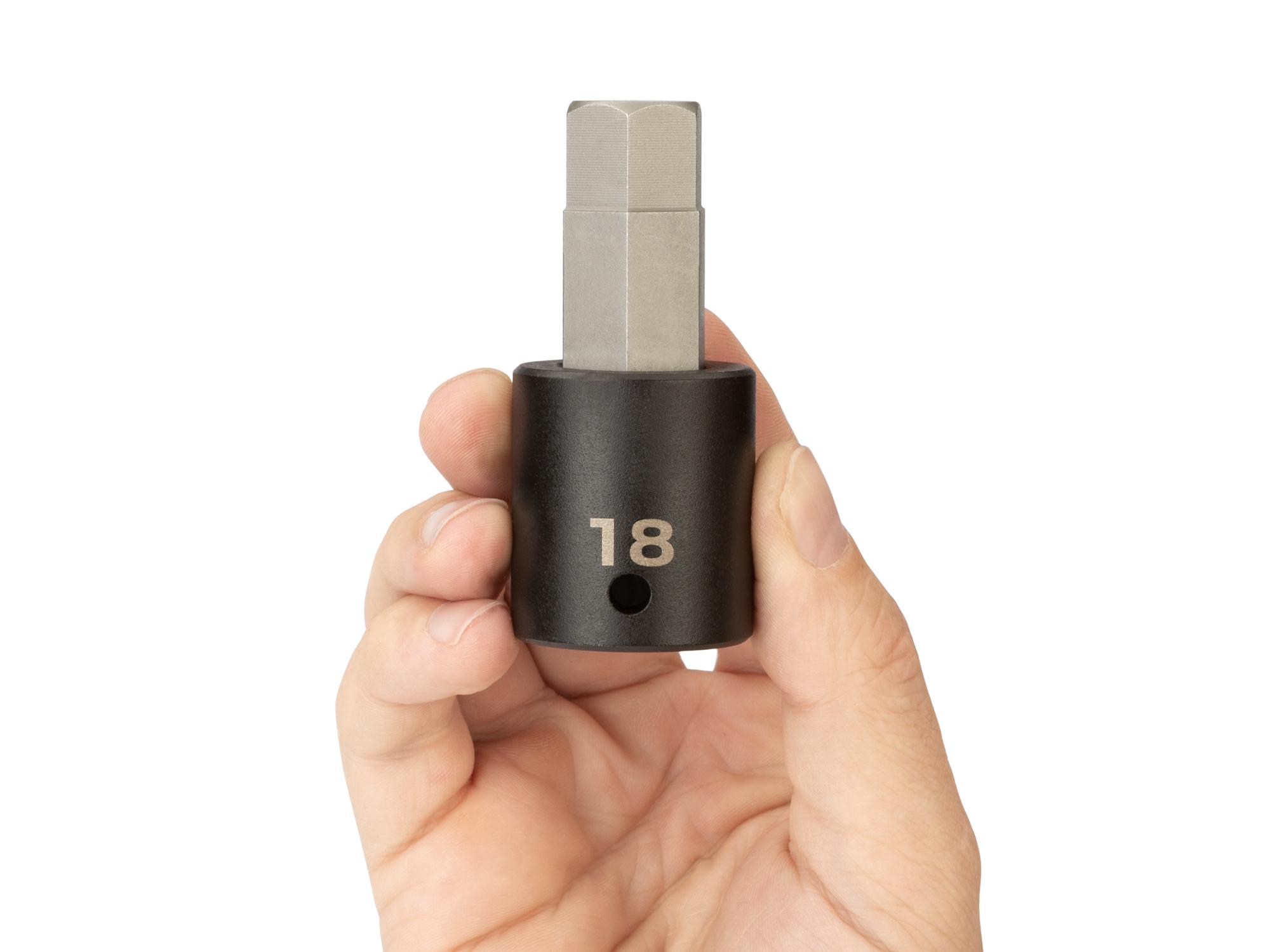 Person holding Tekton impact drive bit socket. Item #SIB23218
