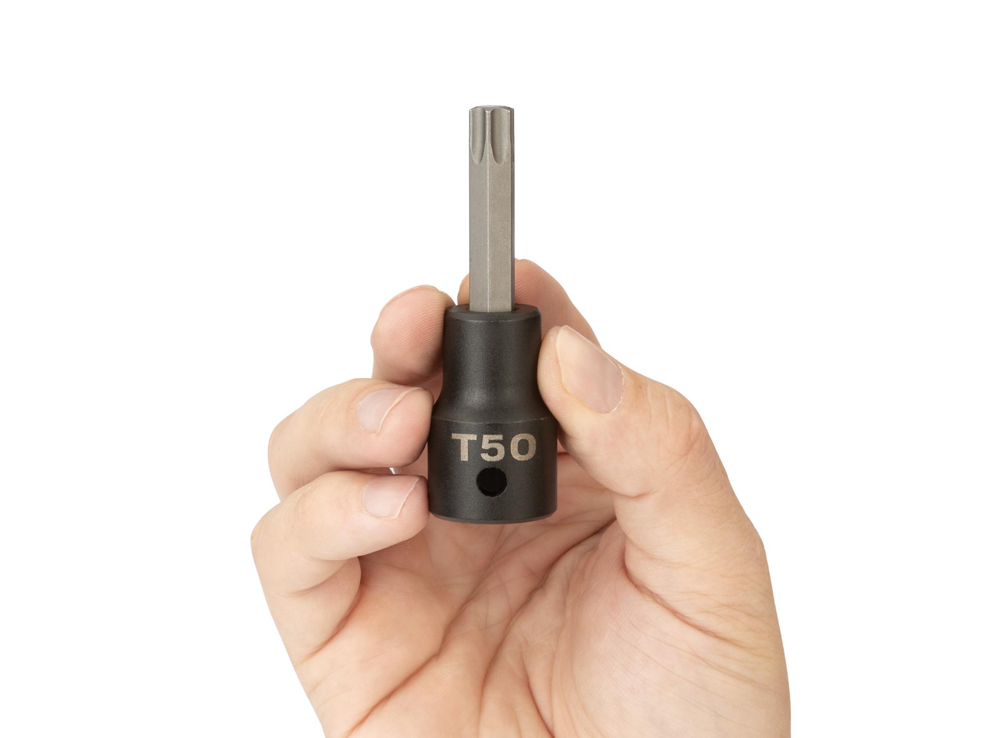 Person holding Tekton impact drive bit socket. Item #SIB24250
