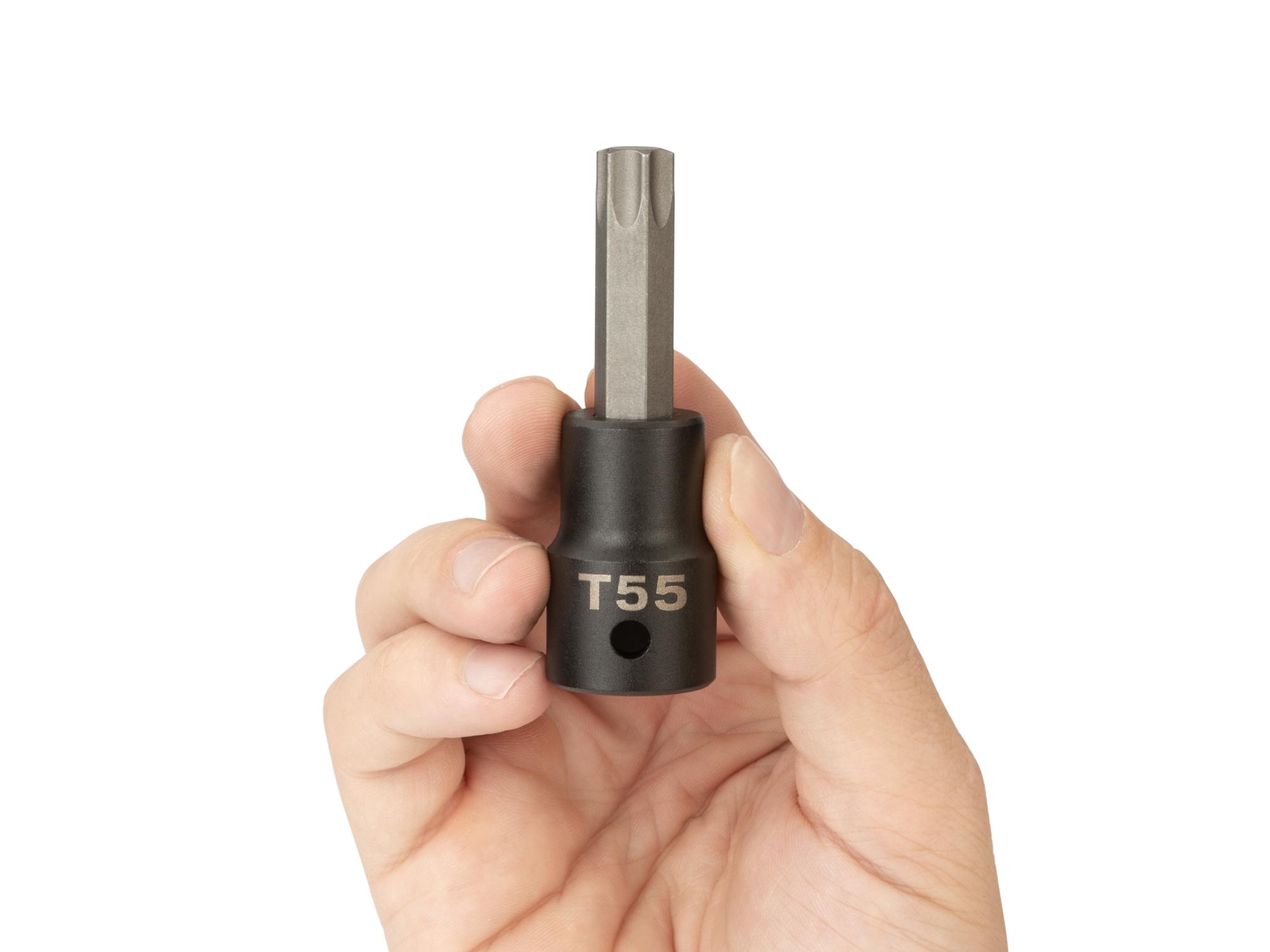 Person holding Tekton impact drive bit socket. Item #SIB24255