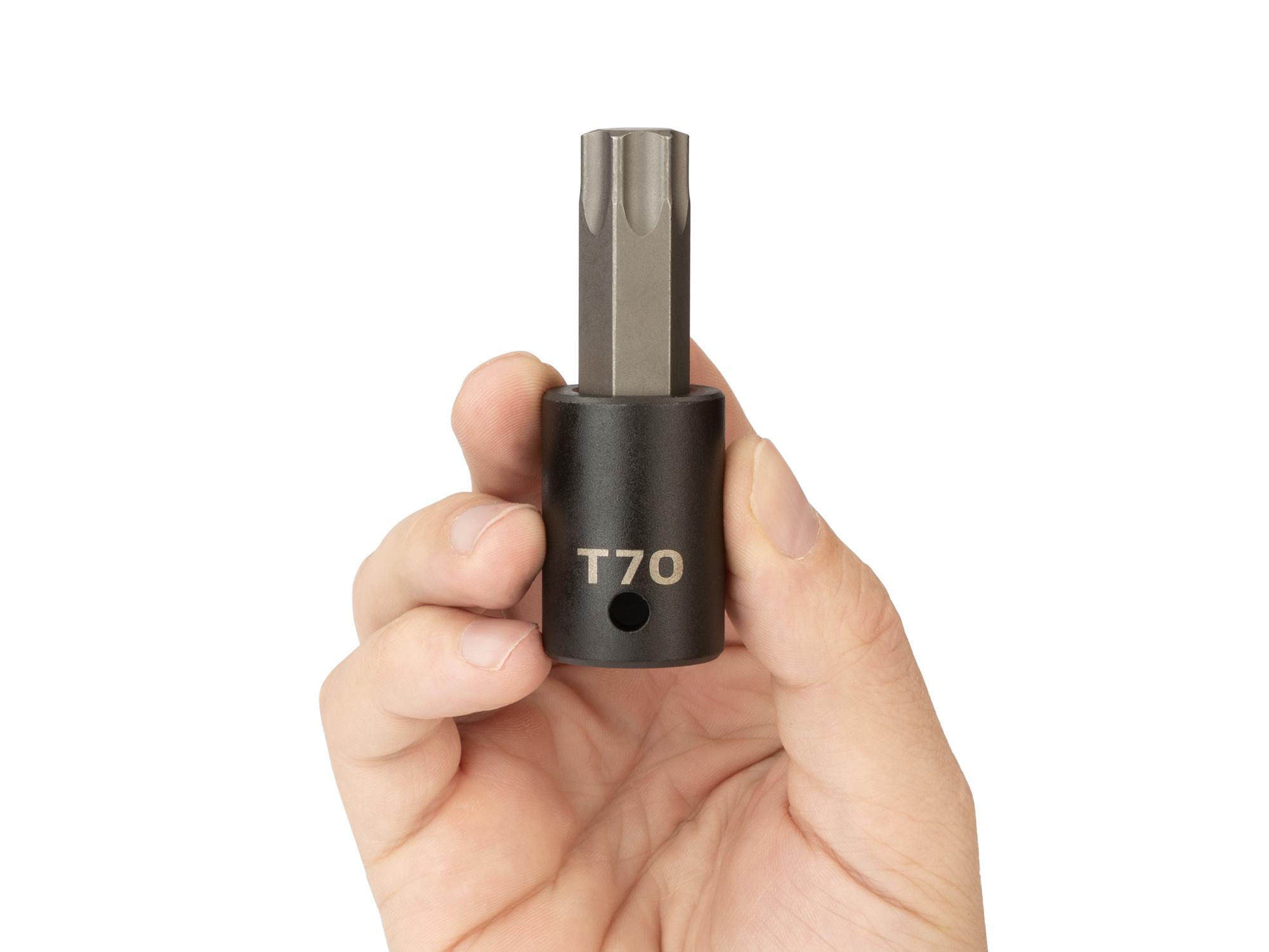 Person holding Tekton impact drive bit socket. Item #SIB24270