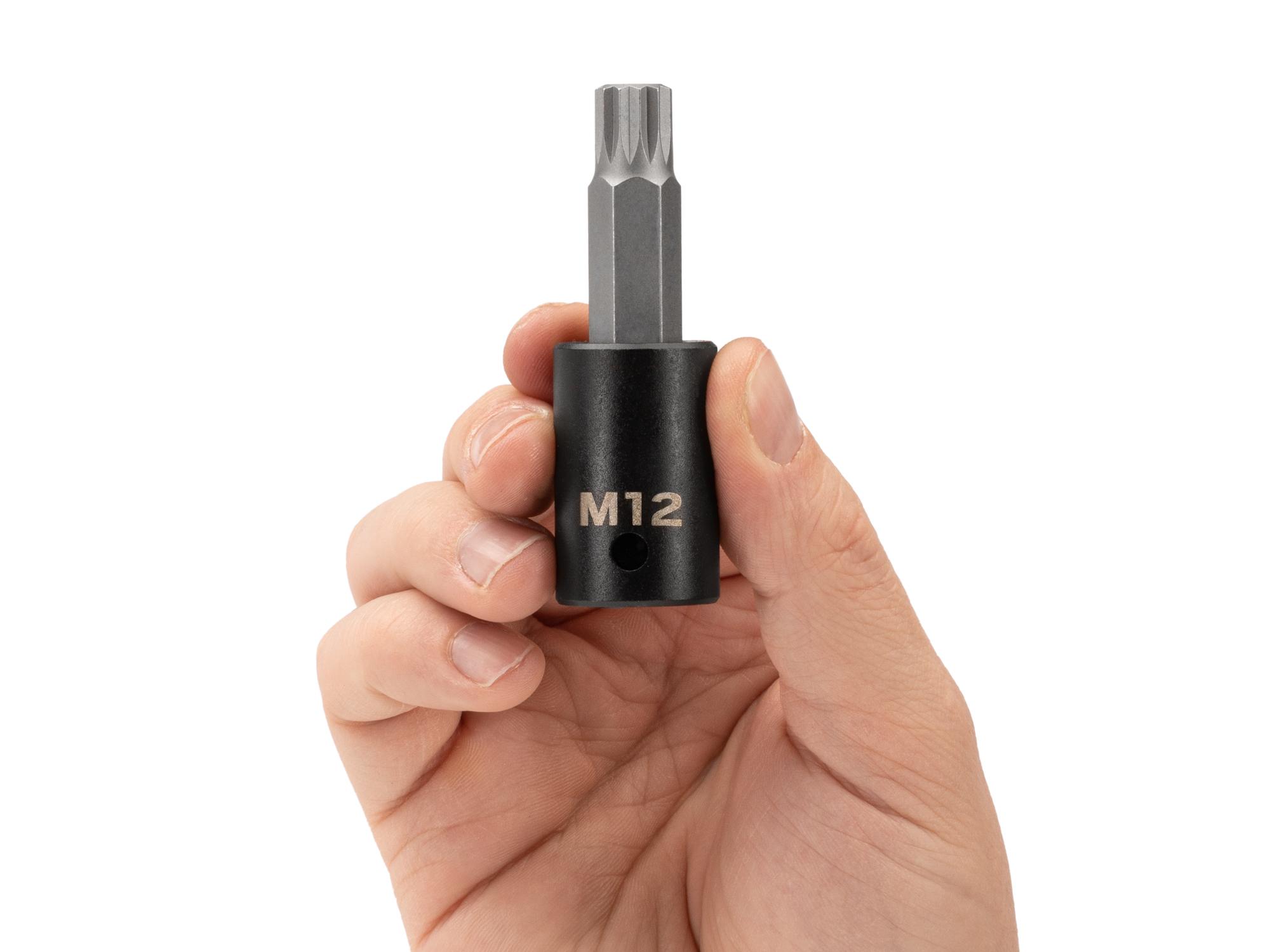 Person holding Tekton impact drive bit socket. Item #SIB28212