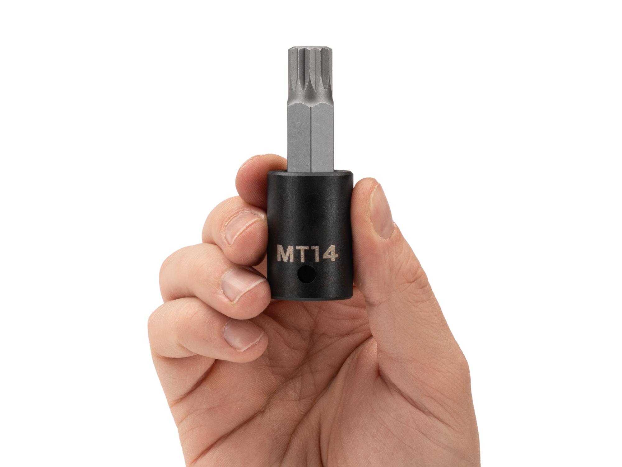 Person holding Tekton impact drive bit socket. Item #SIB29214