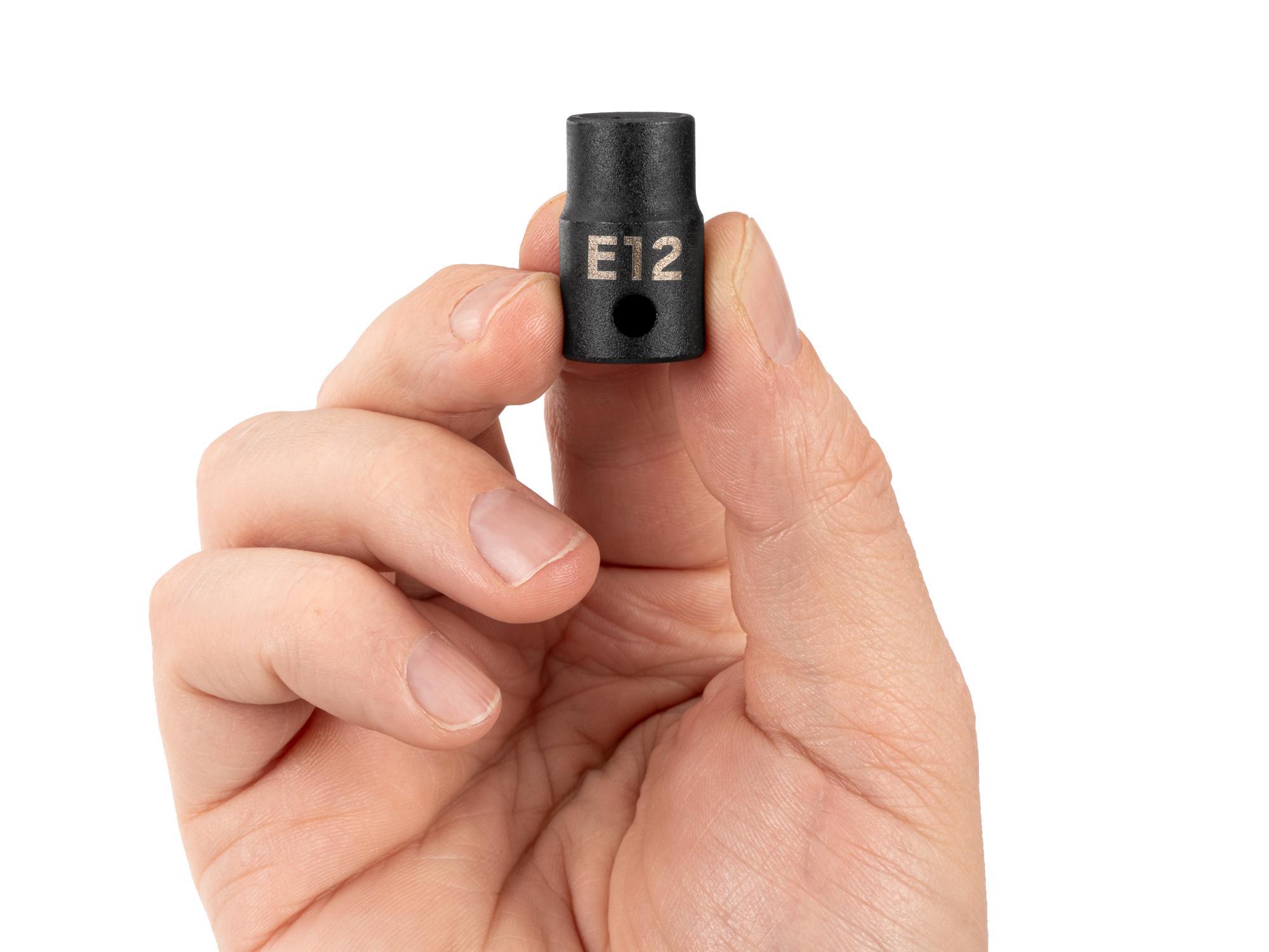 Person holding Tekton impact drive external star socket. Item #SID12412