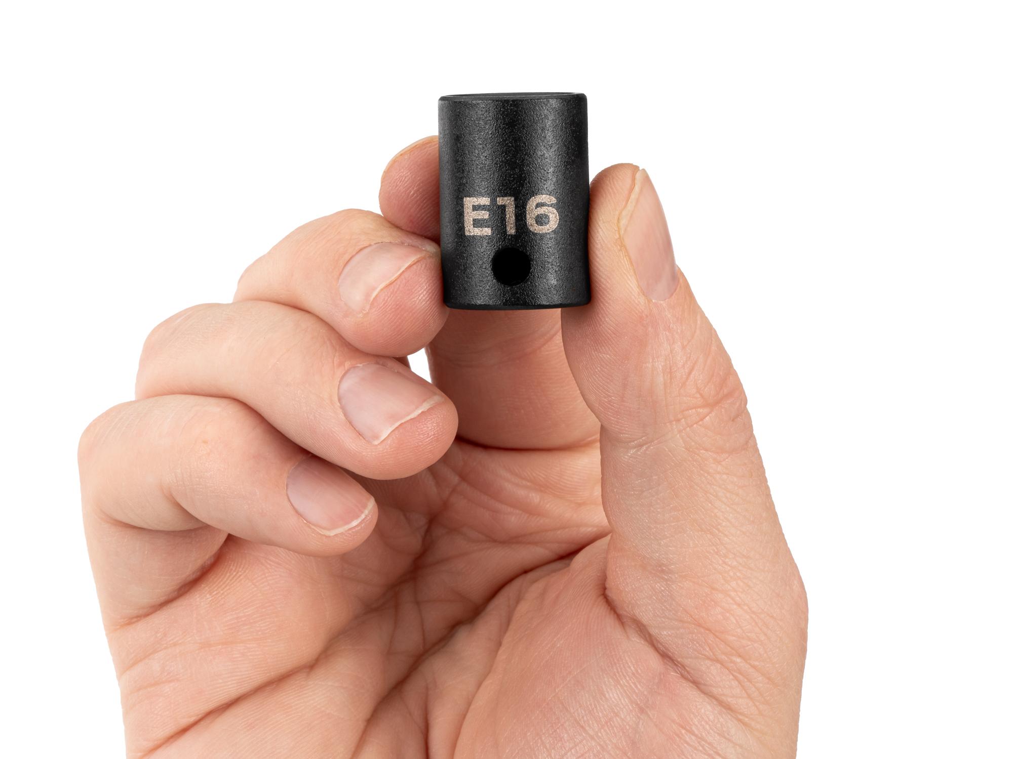 Person holding Tekton impact drive external star socket. Item #SID12416