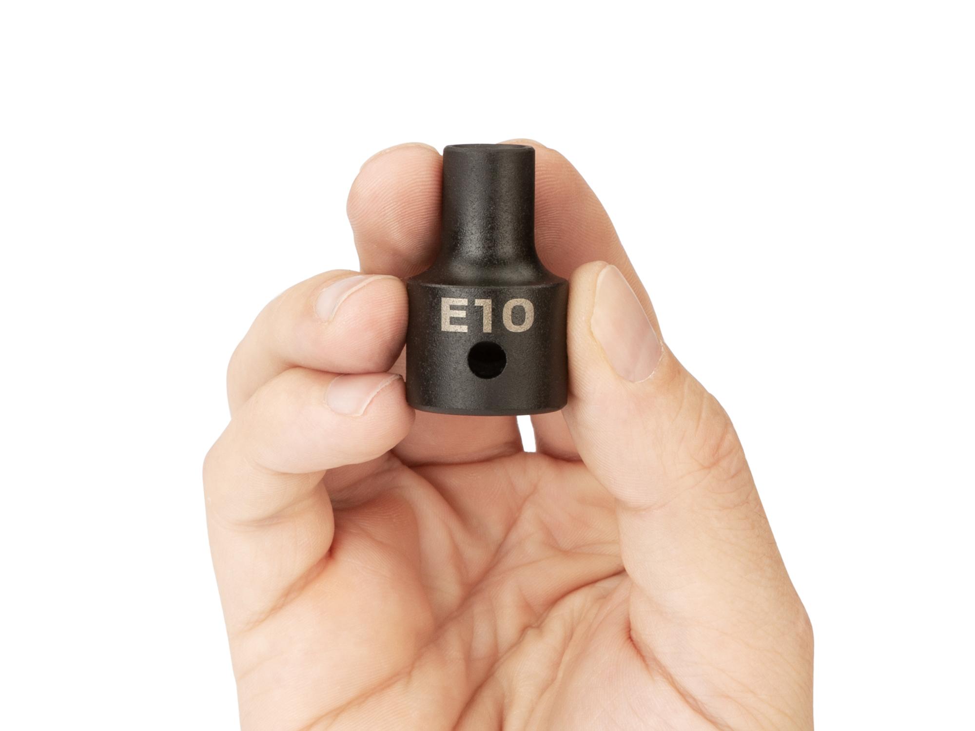Person holding Tekton impact drive external star socket. Item #SID22410