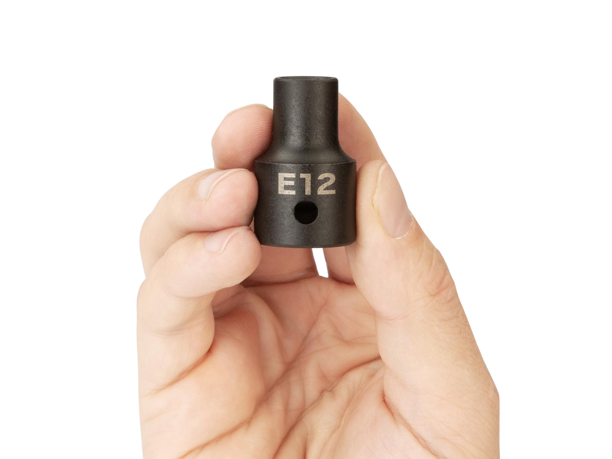 Person holding Tekton impact drive external star socket. Item #SID22412