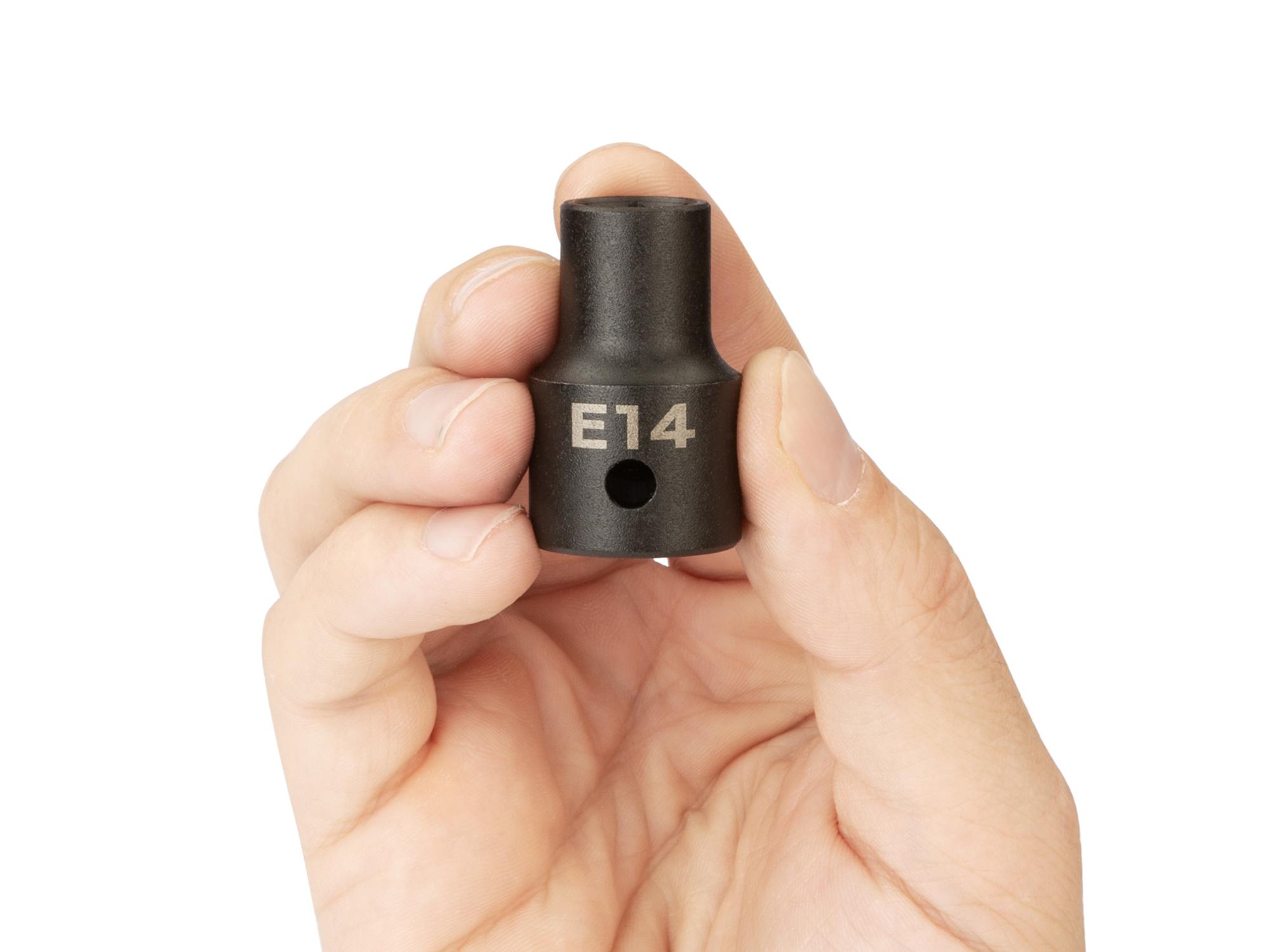 Person holding Tekton impact drive external star socket. Item #SID22414