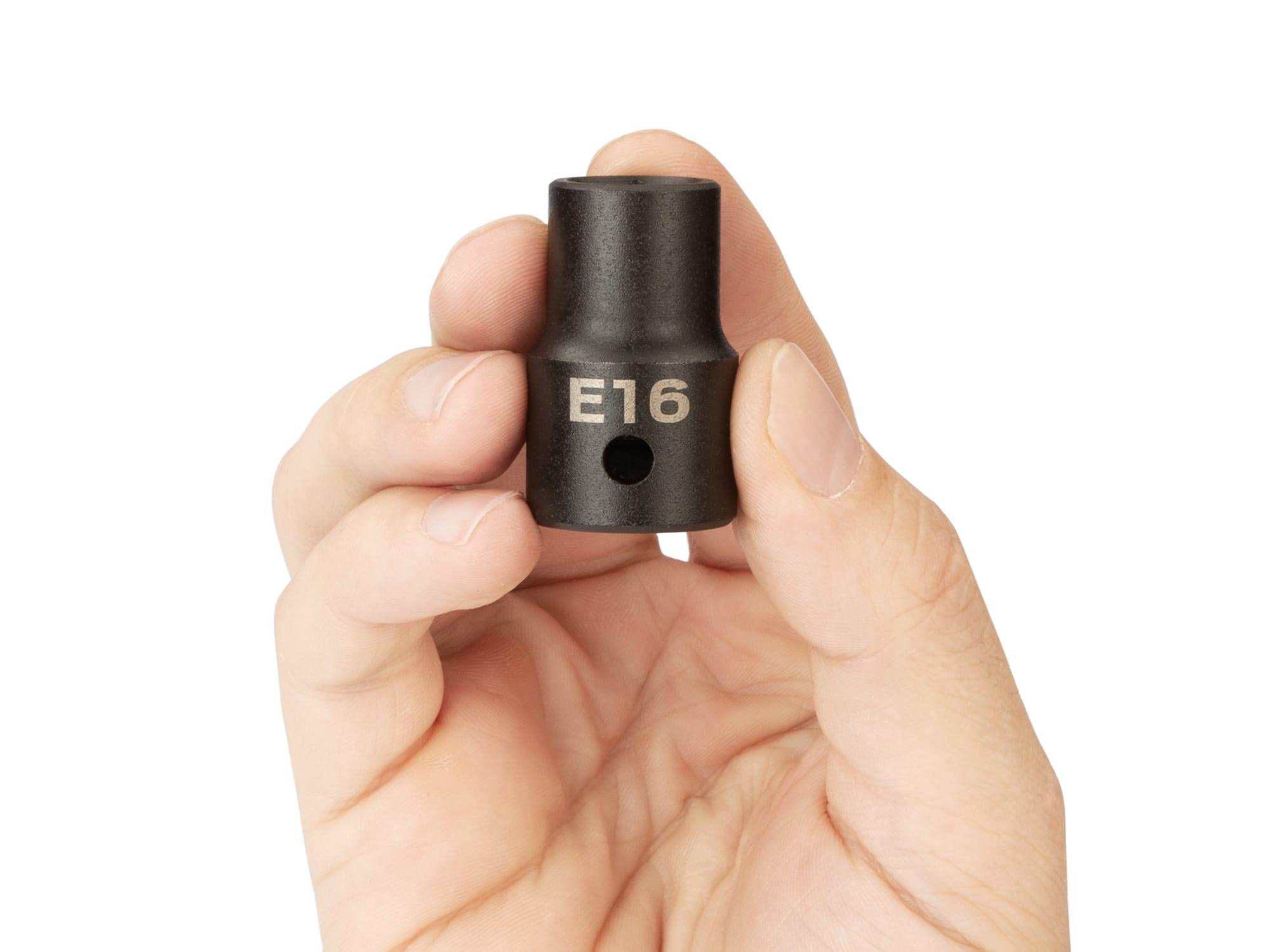 Person holding Tekton impact drive external star socket. Item #SID22416