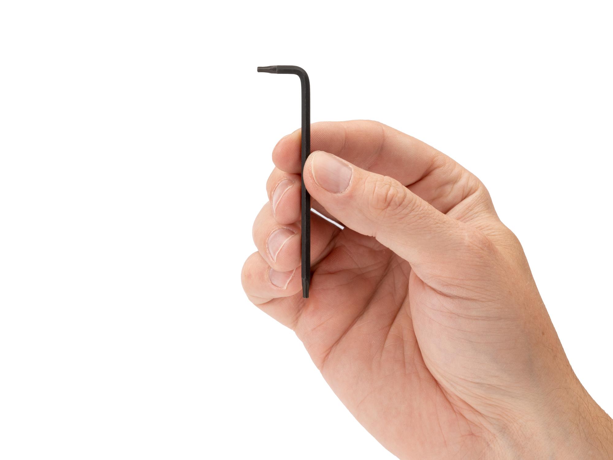 Person holding Tekton l-key. Item #KLT22080