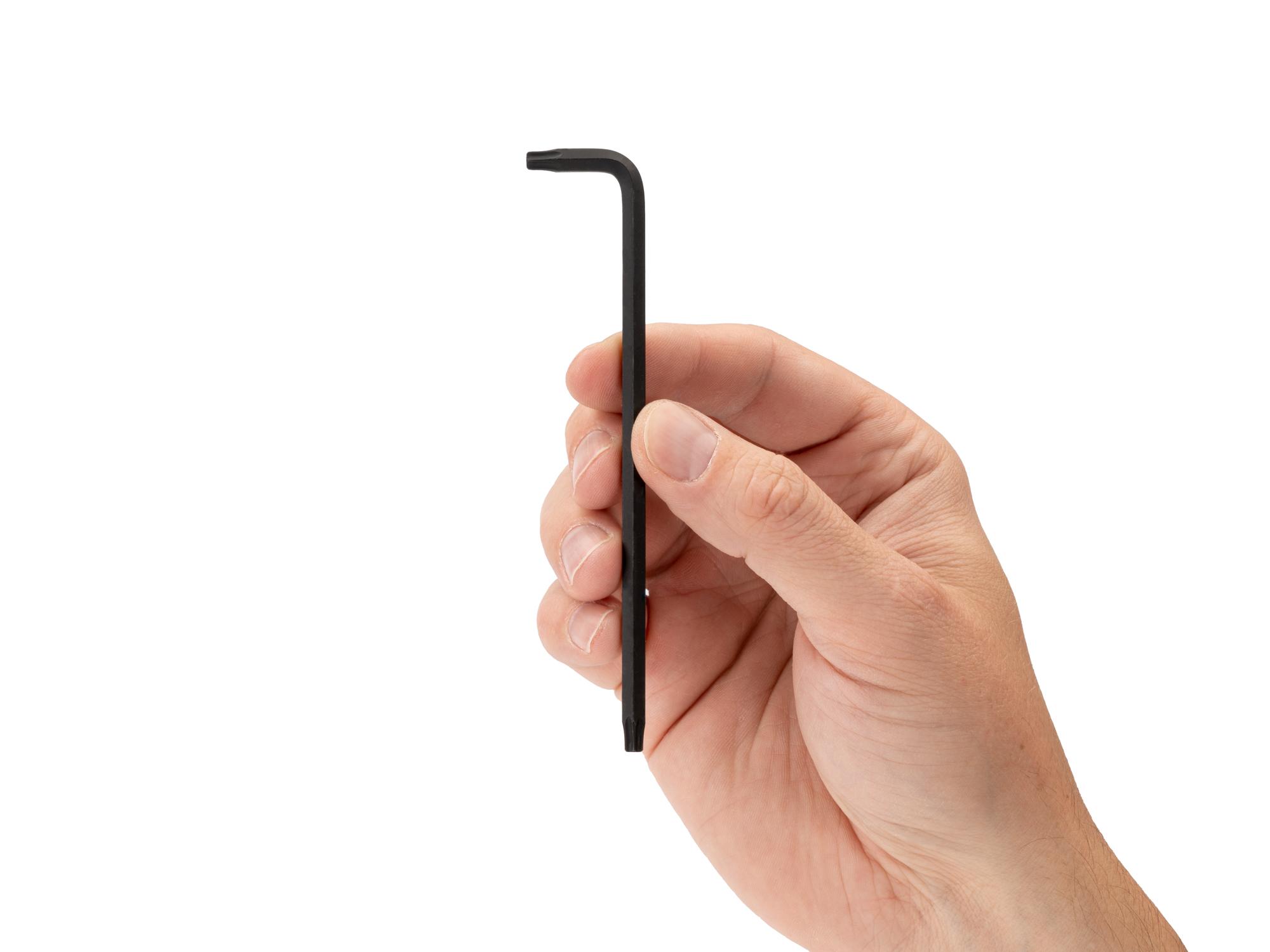 Person holding Tekton l-key. Item #KLT22250