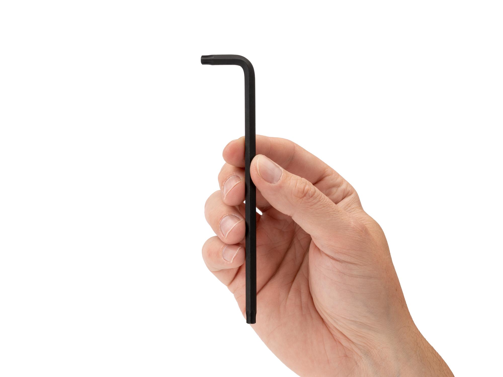 Person holding Tekton l-key. Item #KLT22300