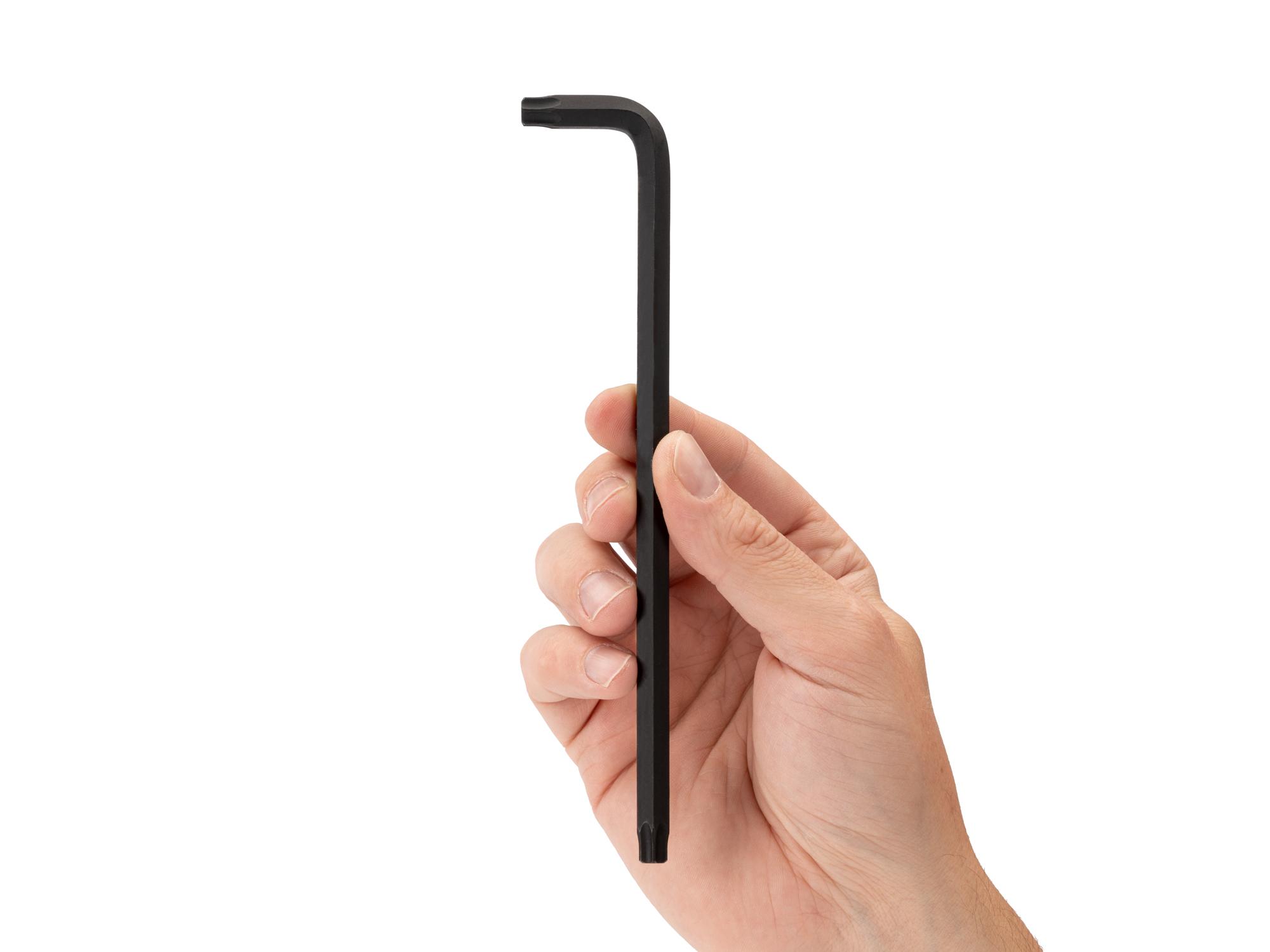 Person holding Tekton l-key. Item #KLT22450